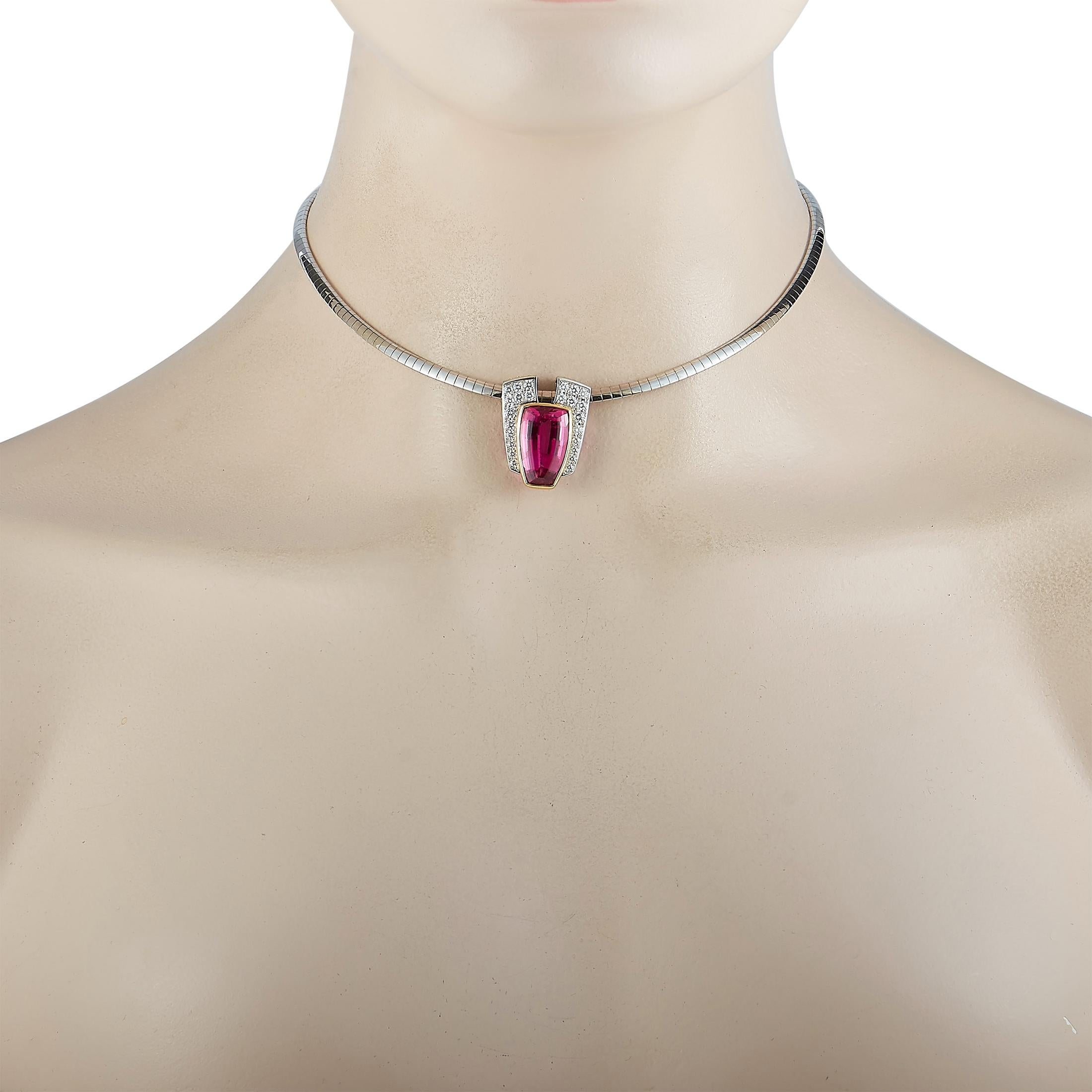 This LB Exclusive necklace is made out of platinum and 18K yellow gold and embellished with a 12.85 ct tourmaline and a total of 1.09 carats of diamonds. The necklace weighs 27.9 grams and boasts a 15” chain and a pendant that measures 1” in length