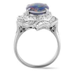 LB Exclusive Platinum Round and Tapered Baguette Diamonds and Opal Oval Ring