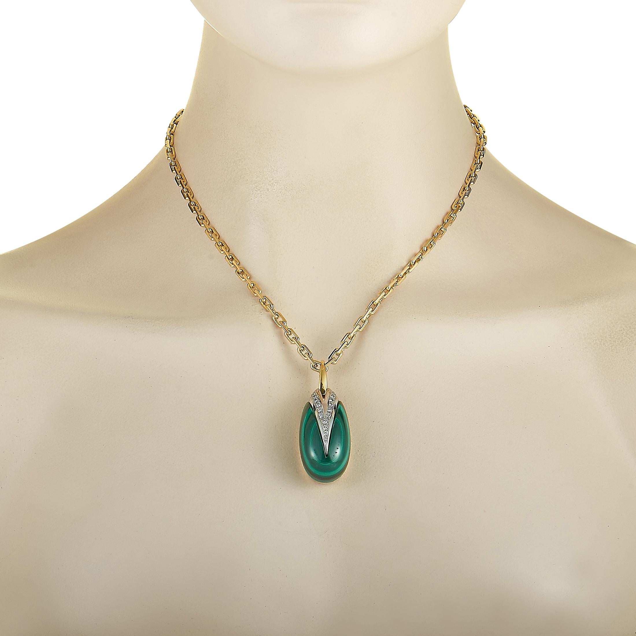 This LB Exclusive necklace is made out of 18K yellow and white gold, boasts a 17” chain and a pendant that measures 2” in length and 0.75” in width. The necklace weighs 63.8 grams. It is set with a malachite and a total of 0.55 carats of