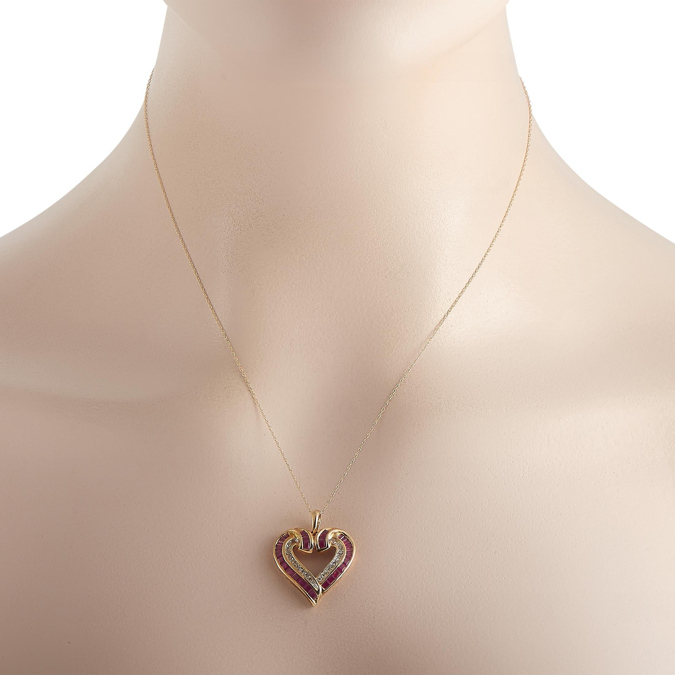 This pretty LB Exclusive 14K Yellow Gold 0.16 ct Diamond Ruby Heart Pendant Necklace is made with a 14K yellow gold chain, highlighting the beautiful 14K yellow gold open heart-shaped pendant which is set with a 0.20-carat row of round diamonds and