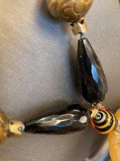 LB Jadeite carved donut pendant necklace with vintage jet, agate, brass and glas