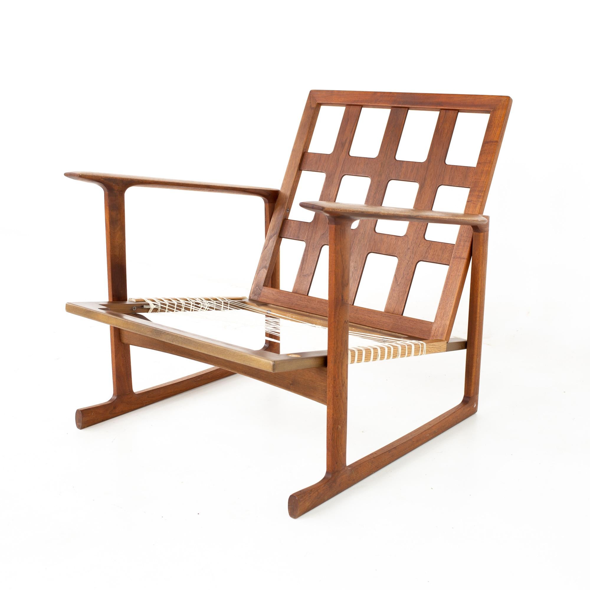 lb Kofod Larsen for Selig mid century lattice back teak sleigh leg lounge chair
Lounge chair measures: 29 wide x 31.5 deep x 28 high, with a seat height of 11.75 inches and arm height of 22 inches 

All pieces of furniture can be had in what we