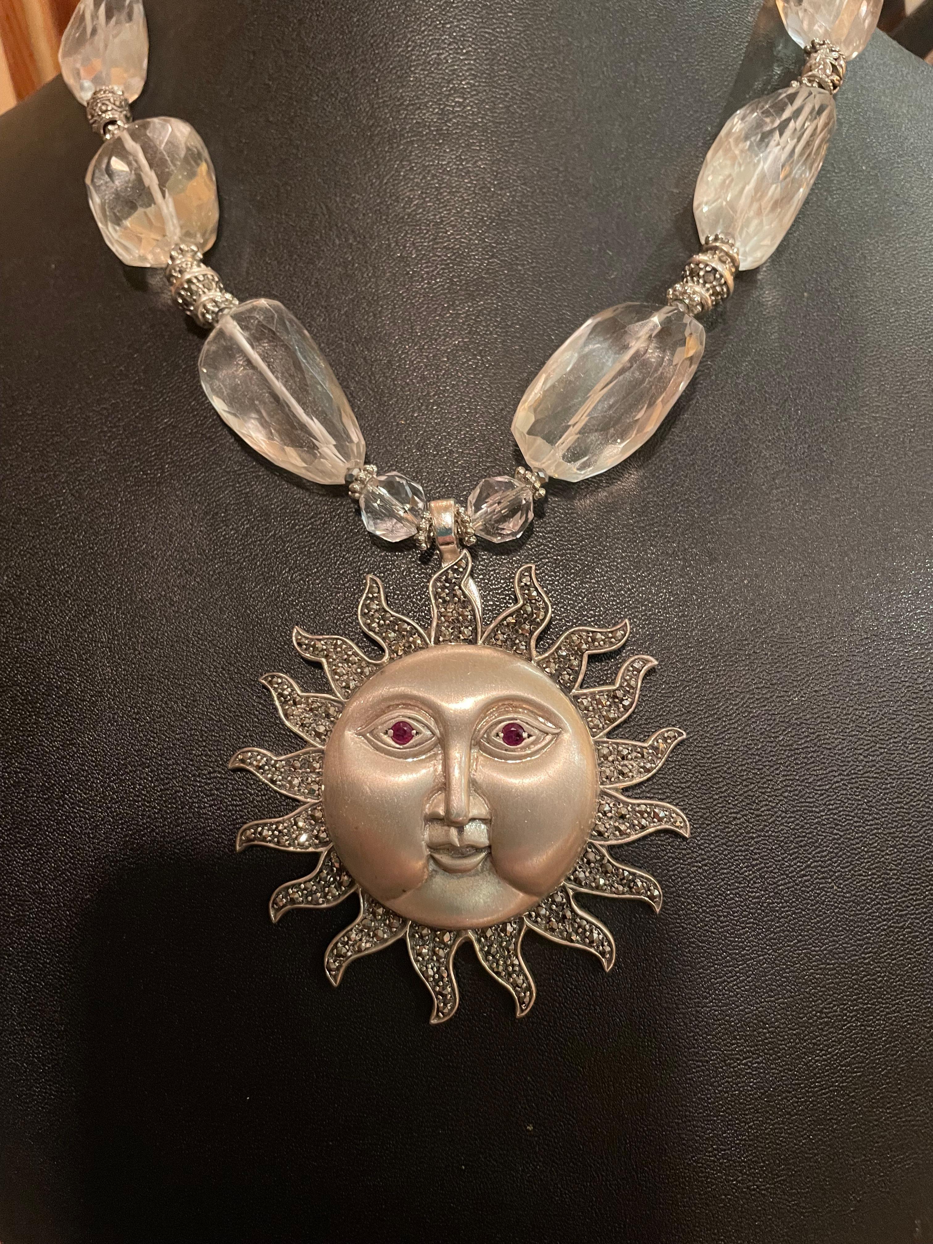Lorraine’s Bijoux offers a Vintage, mid 20th century, Sterling Silver and Marcasite brooch Pendant necklace. This piece is Stunning and will set you apart from the crowd. The string of large faceted rock crystal beads, combined with Sterling Silver