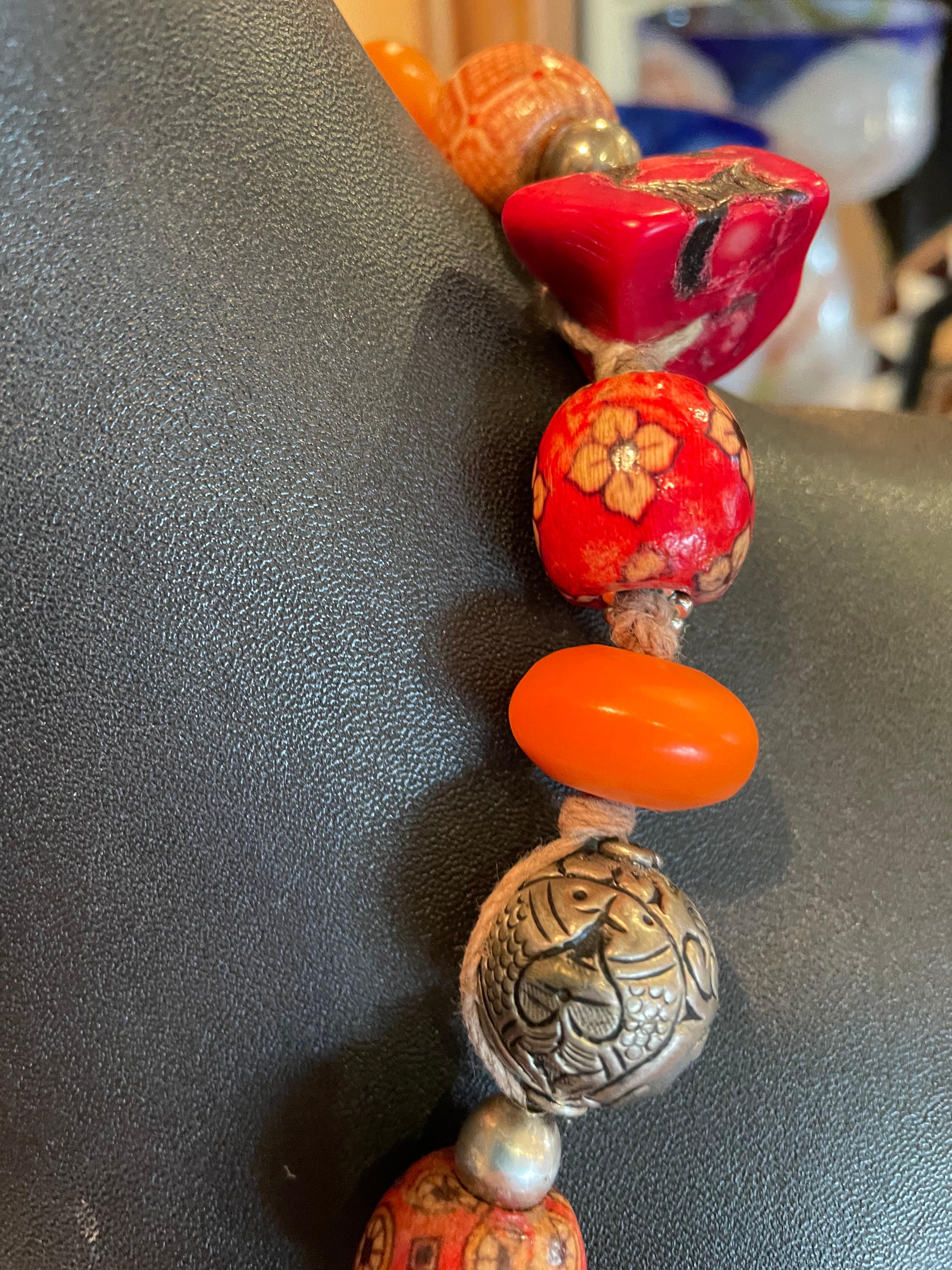 Bead LB offers a tribal amber, coral, Tibetan silver, resin, and wood necklace For Sale