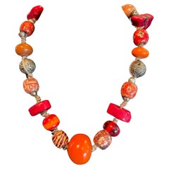 LB offers a tribal amber, coral, Tibetan silver, resin, and wood necklace