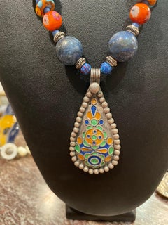 LB offers an antique Moroccan, enamel pendant with lapis /silver beads necklace