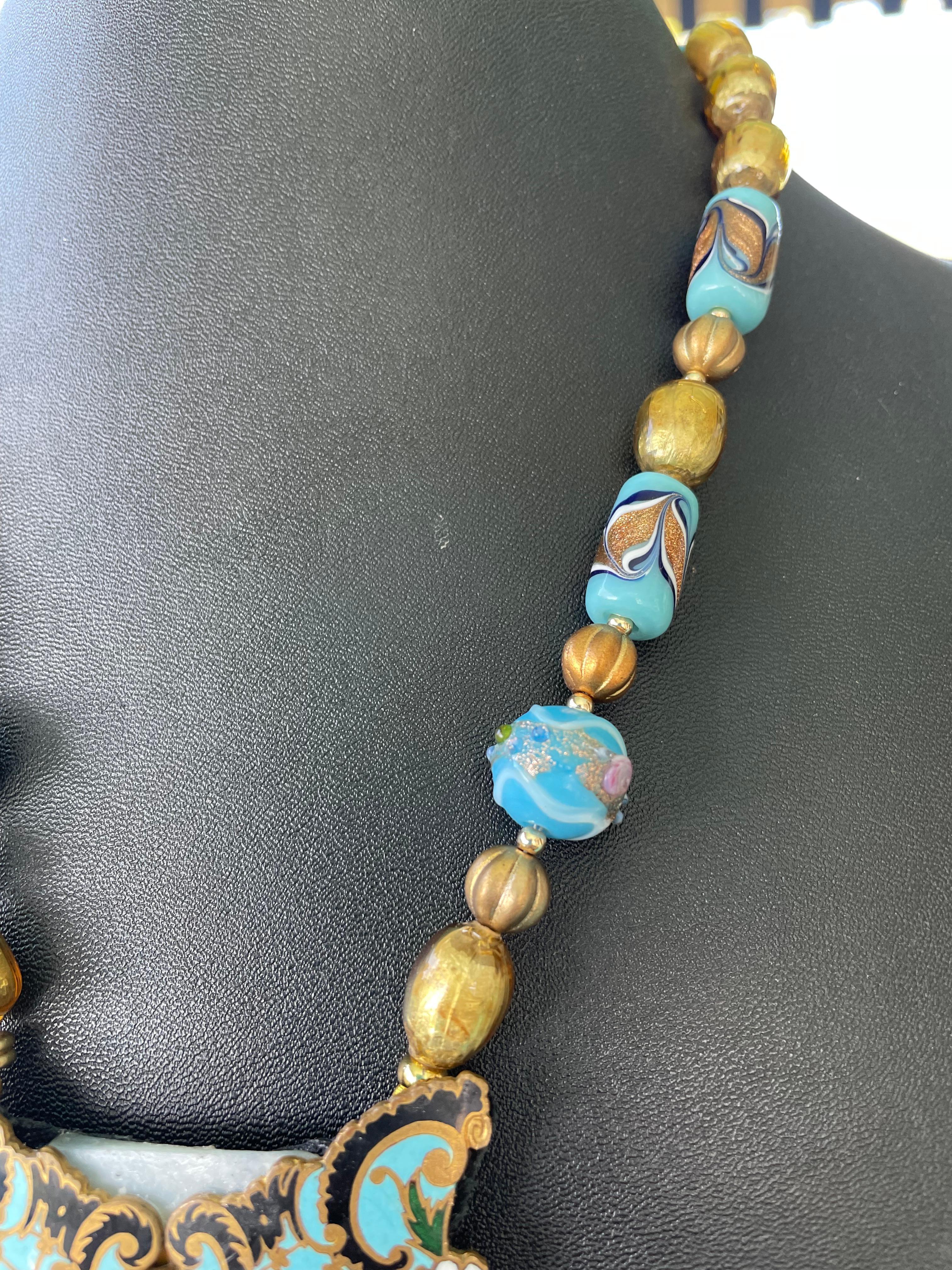 LB offers Art Nouveau Buckle Pendant Venetian and Czech glass beads Necklace In Good Condition In Pittsburgh, PA