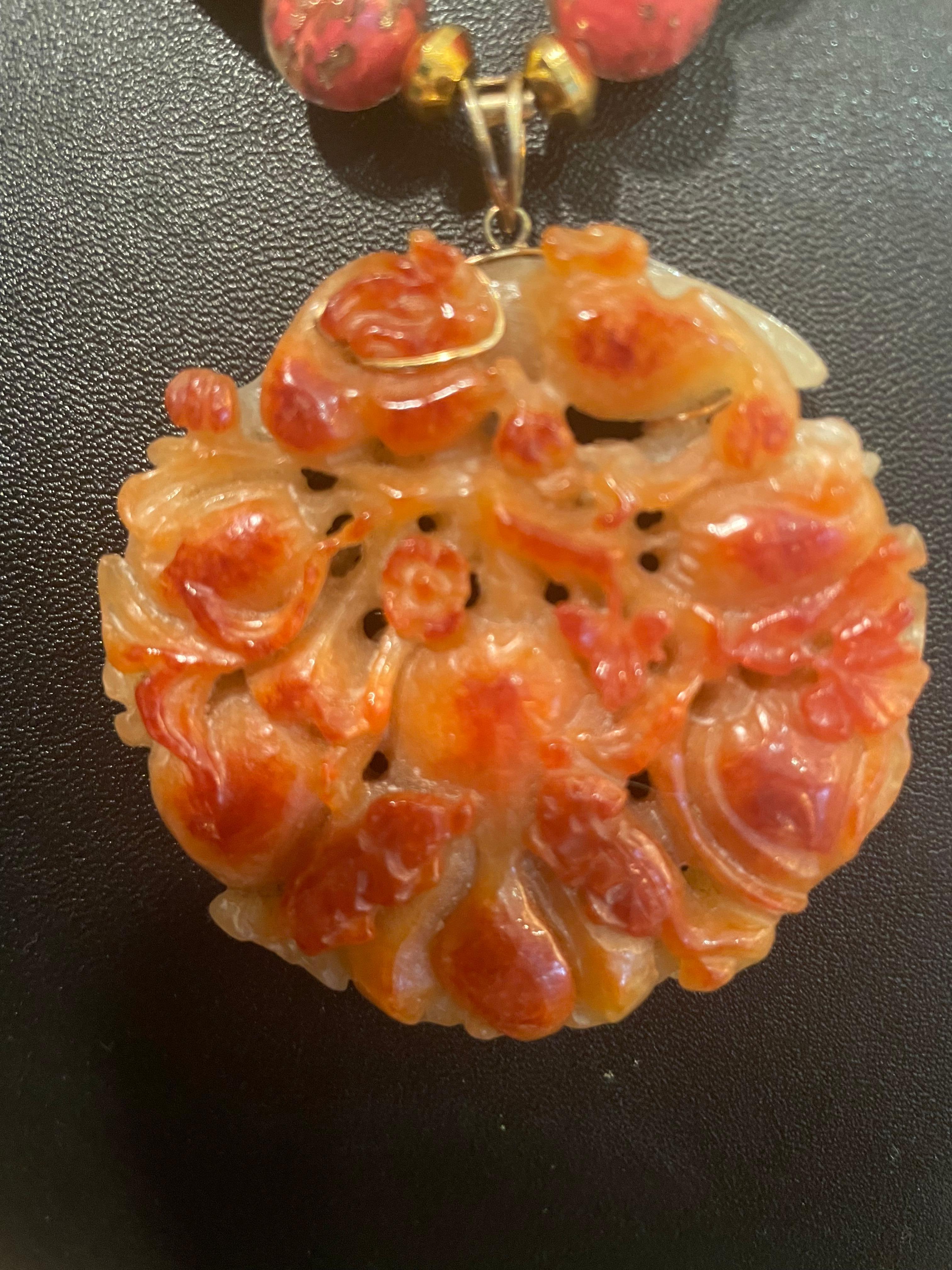 Lorraine’s Bijoux offers an Outstandingly beautiful Early 20th Century, hand carved piece of orange and pale green Chinese Jade. This pendant was sourced at the Baltimore Antique Show several years ago from a dealer in antique Asian artifacts. The