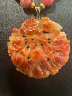 LB offers Early 20th c. Carved orange Jade Carnelian African Ceramic necklace