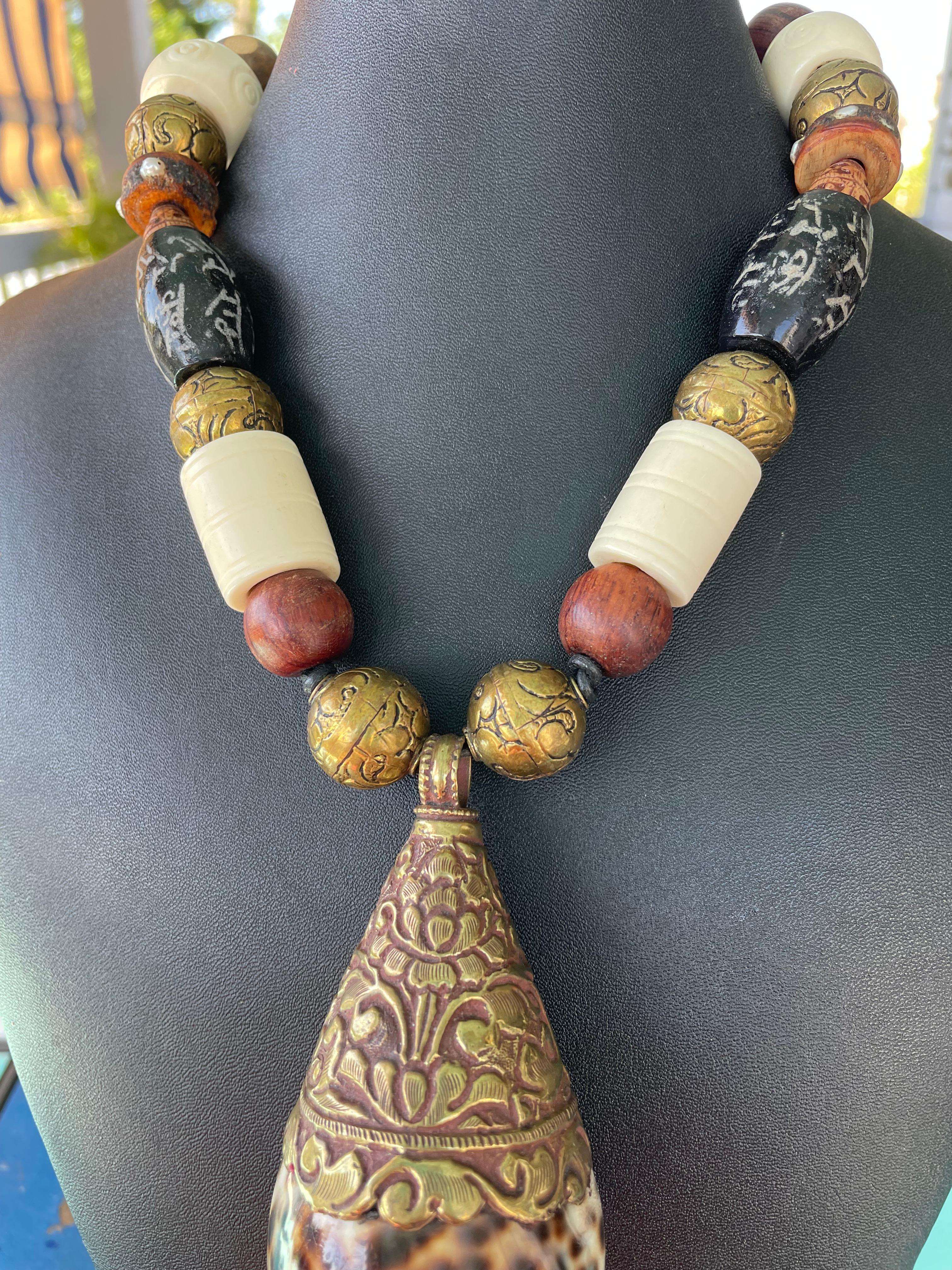 Artisan LB offers Large Spotted Tiger Cowrie Shell pendant Bone Brass Glass necklace