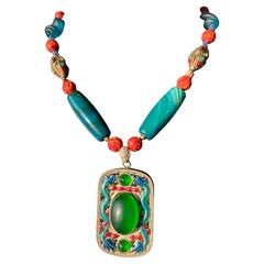 LB propose un collier en verre vénitien avec pendentif chinois en émail sterling et agates sarcelles