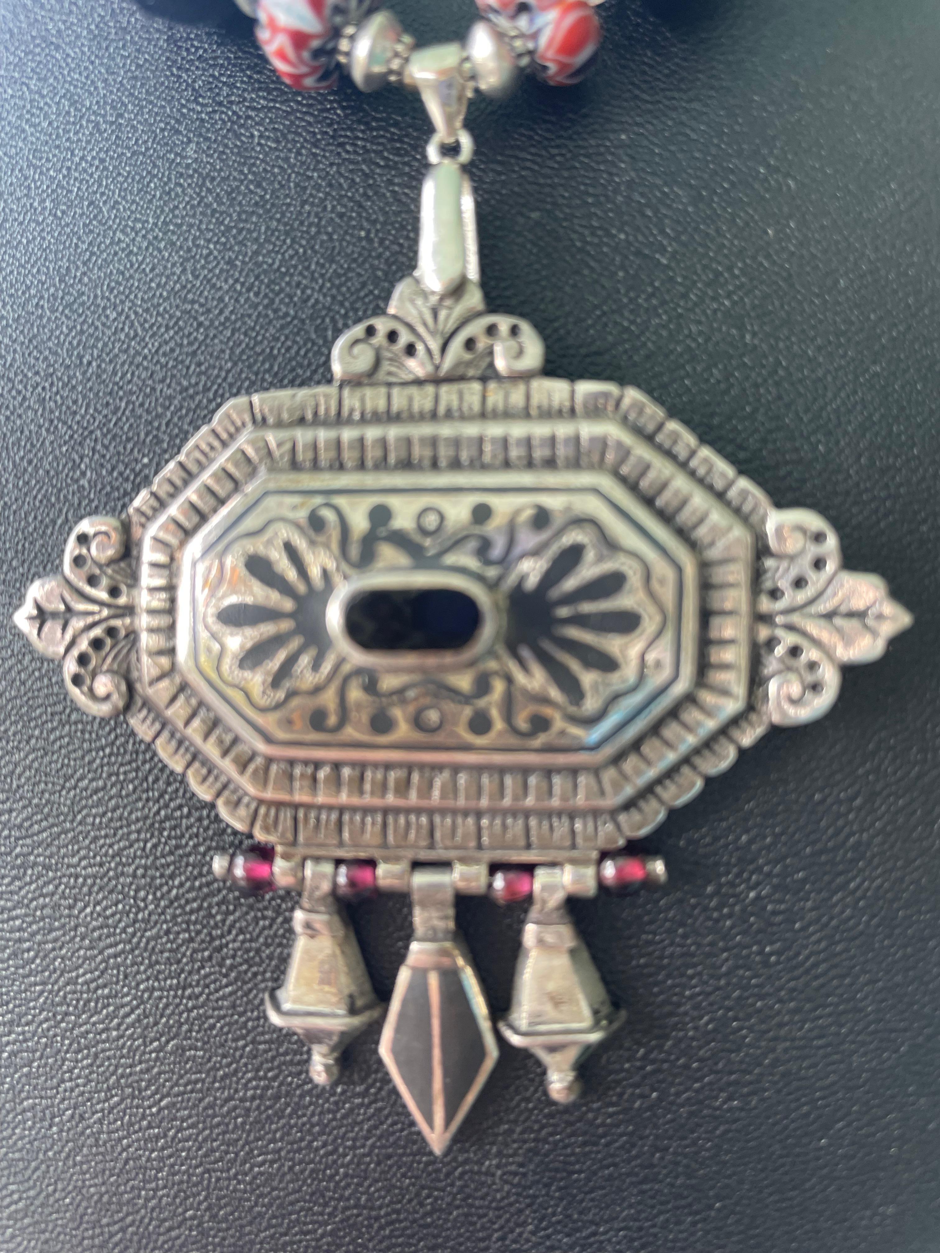 Lorraine’s Bijoux has on offer Vintage Sterling Silver Austro Hungarian Empire Pendant. This unusual Neo Classical style is stunning and very refined. Vintage large faceted jet beads,
Vintage Venetian glass chevron beads, cube shaped Sterling Silver