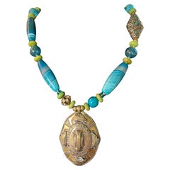 LB offers Vintage Brass Repousse pendant Agates Turquoise Glass Tibetan necklace