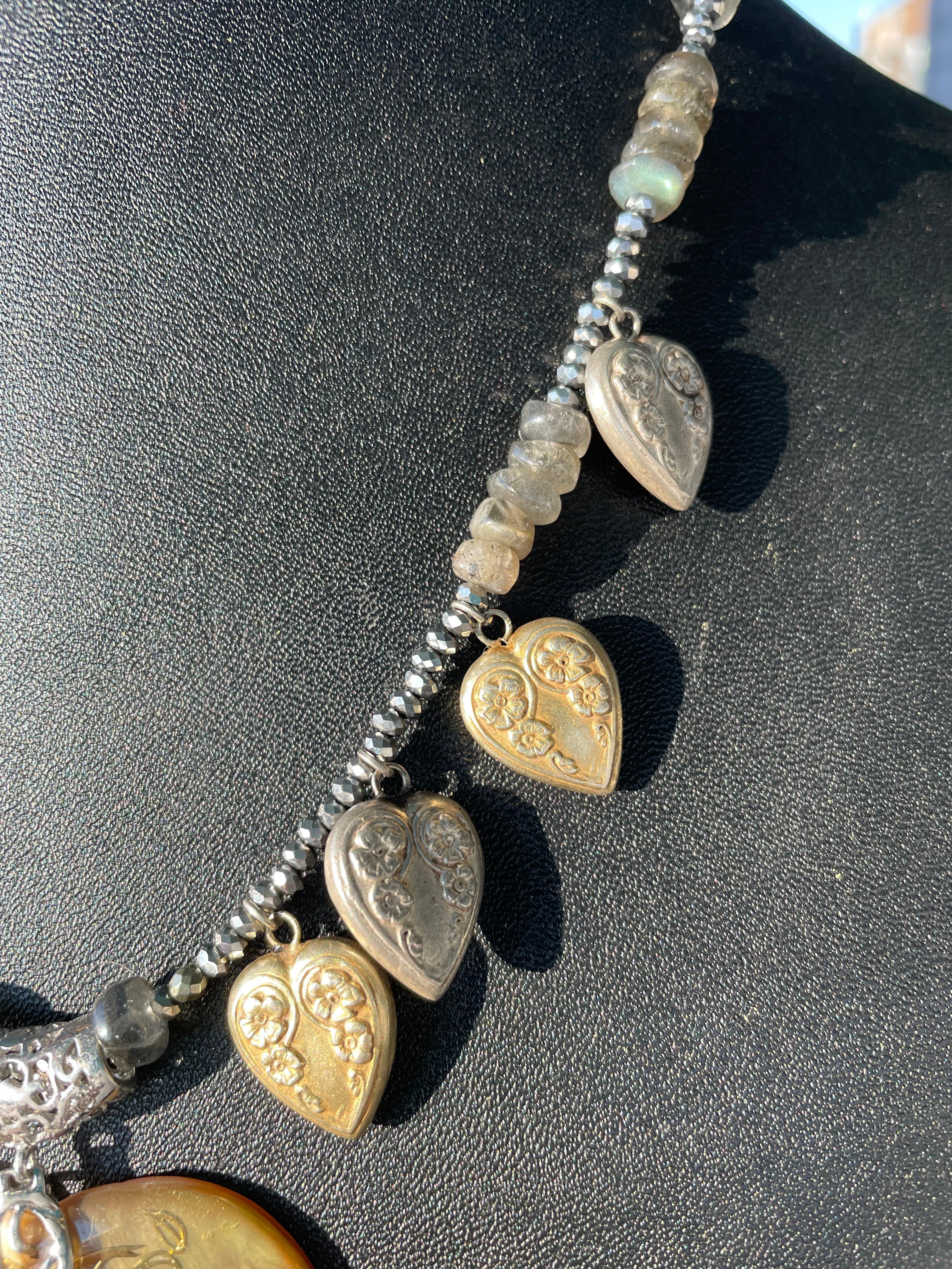 LB offers Vintage inlaid Shell pendant Vintage Sterling Mexican hearts necklace In Good Condition For Sale In Pittsburgh, PA