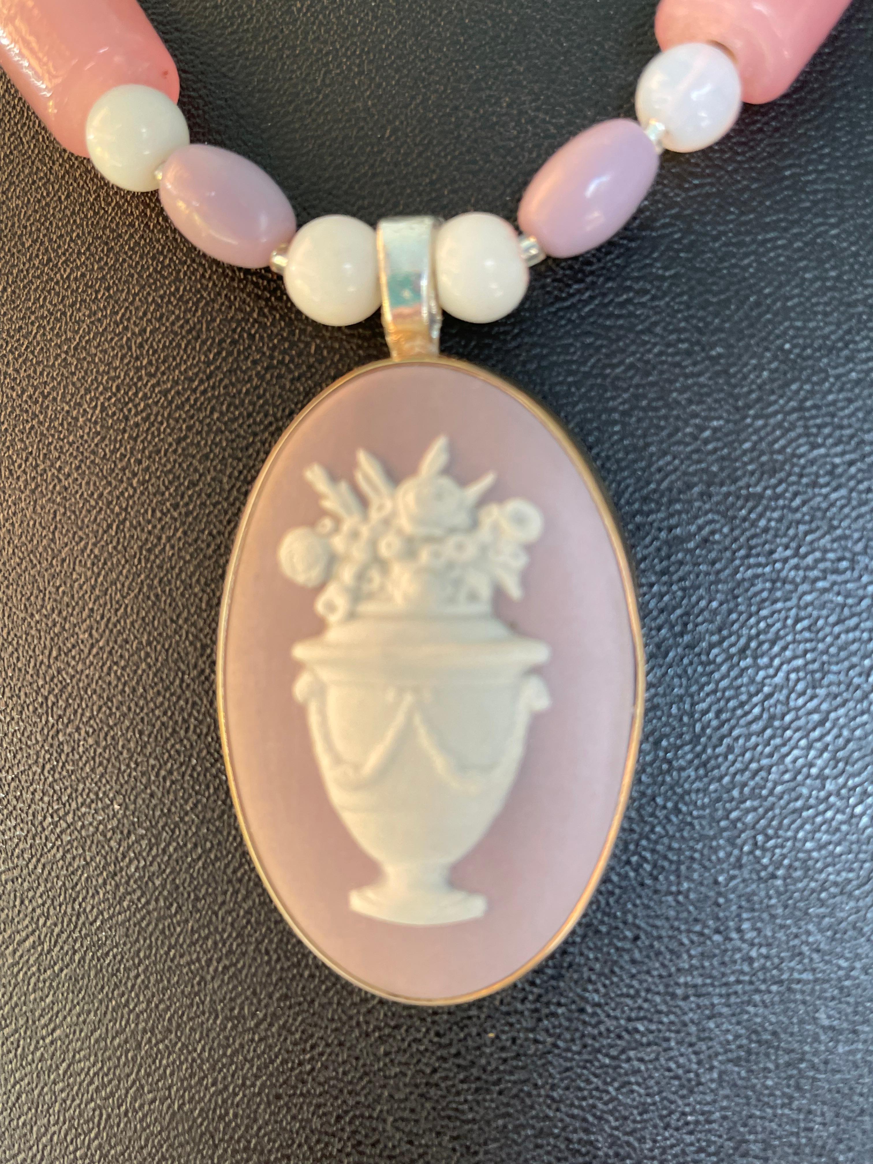 Lorraine’s Bijoux has on offer a Vintage Wedgewood, Jasperware, Mauve colored cameo pendant necklace. This Stunninf and very Feminine piece is quite unusual and will enhance any outfit in pastels as well as your LBD.The beads consist of pink opal