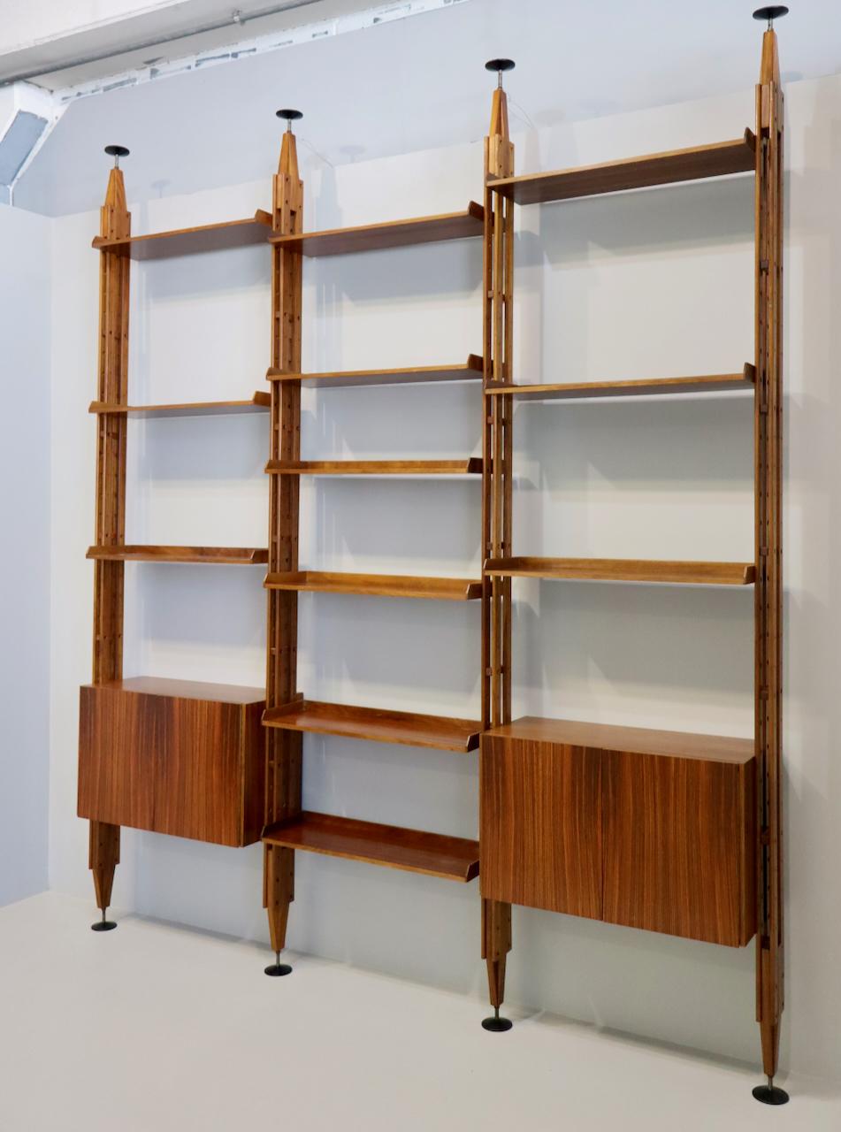  library, Franco Ablini for Poggi, Italy, 1950. Elegant Franco Albini library or room divider. Shelves and units can be adjusted or put in different positions. The feet are in lacquered aluminum. The height is adjustable from 310 to 335 cm.