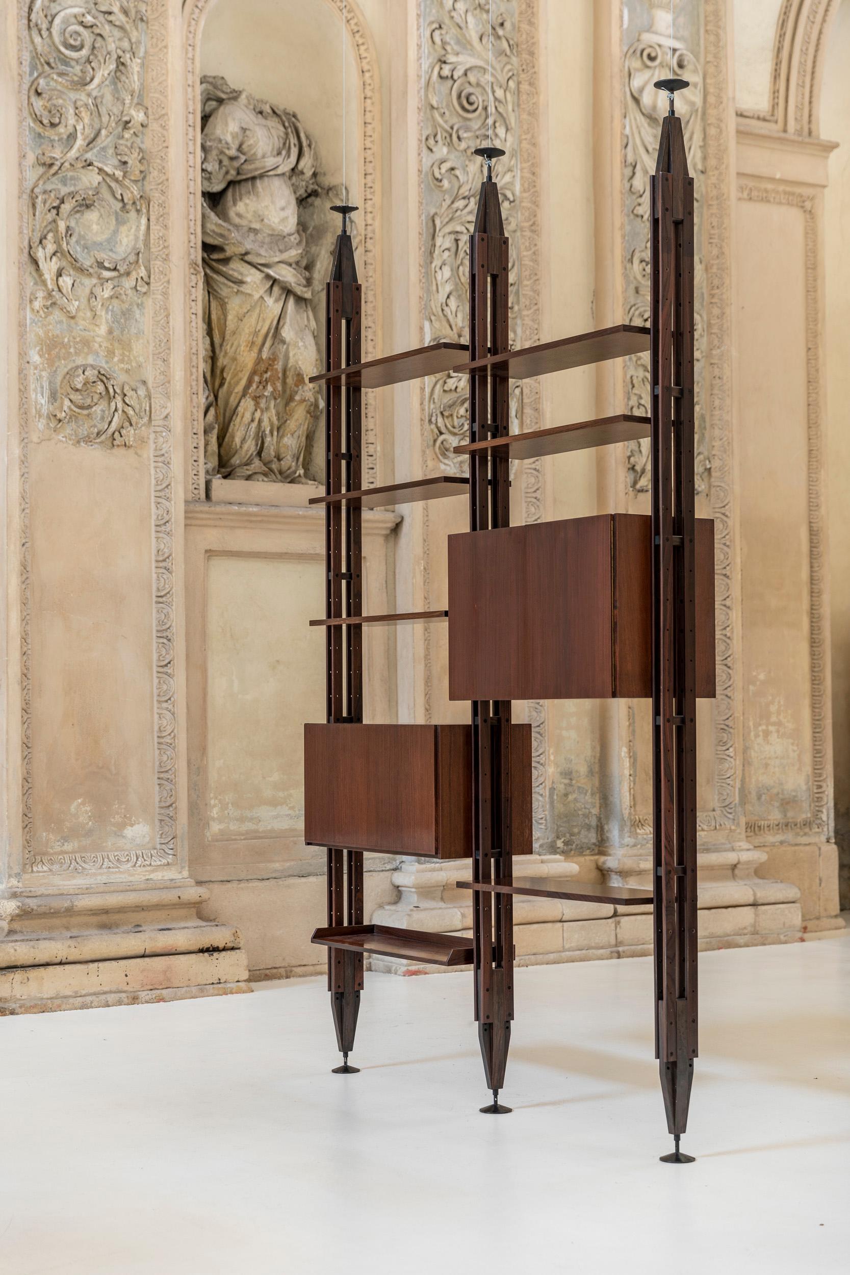 Modular bookcase designed by Franco Albini in 1957 for Poggi Pavia. 
 An extremely flexible bookcase, with different modular options, suited to being against a wall or as a room partition. Franco Albini designed this piece between 1956 and 1957