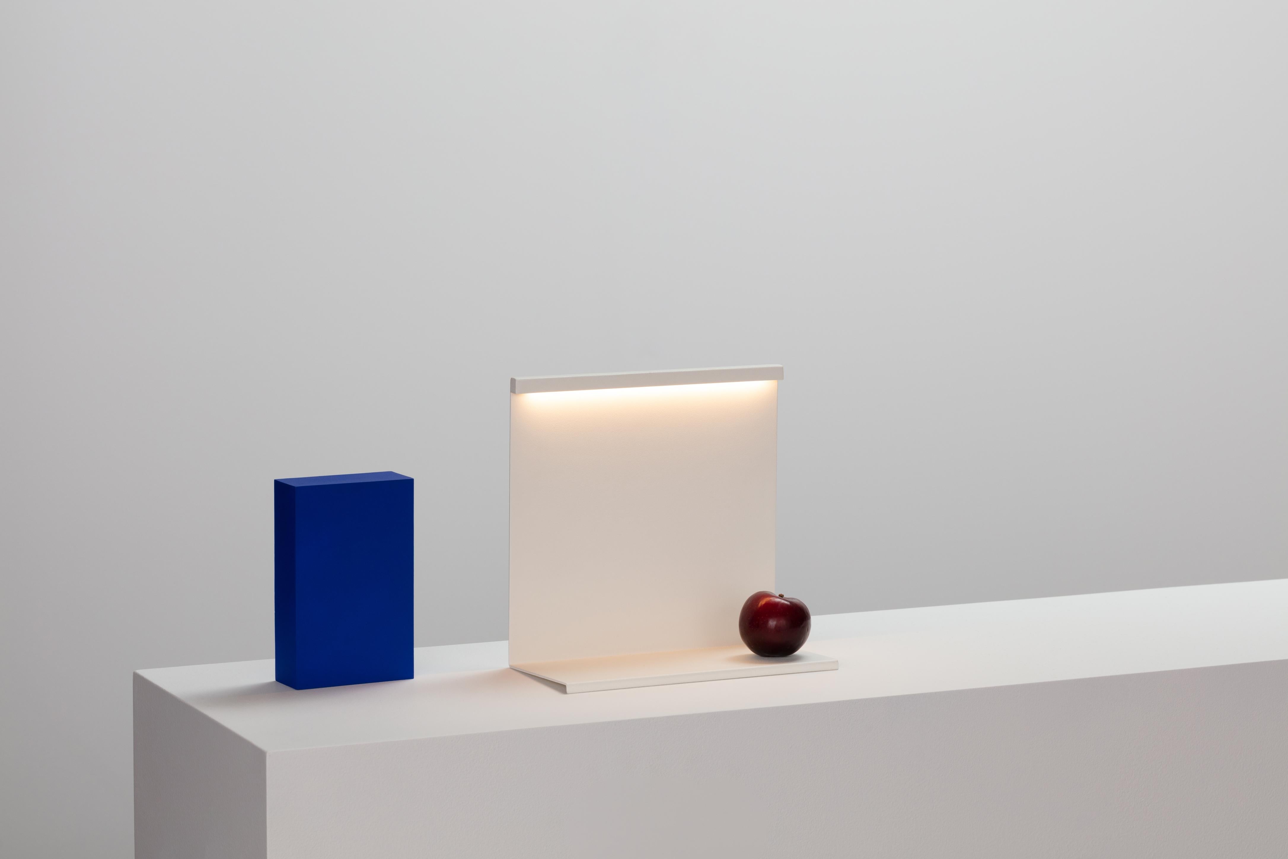 
Inspired by the innovative architecture of fellow Mexican Luis Barragan, Moisés Hernández designed the LBM Table Lamp to reflect his fascination with monolithic geometry, colour, light and shadows. Constructed from thin planes of vertical sheet