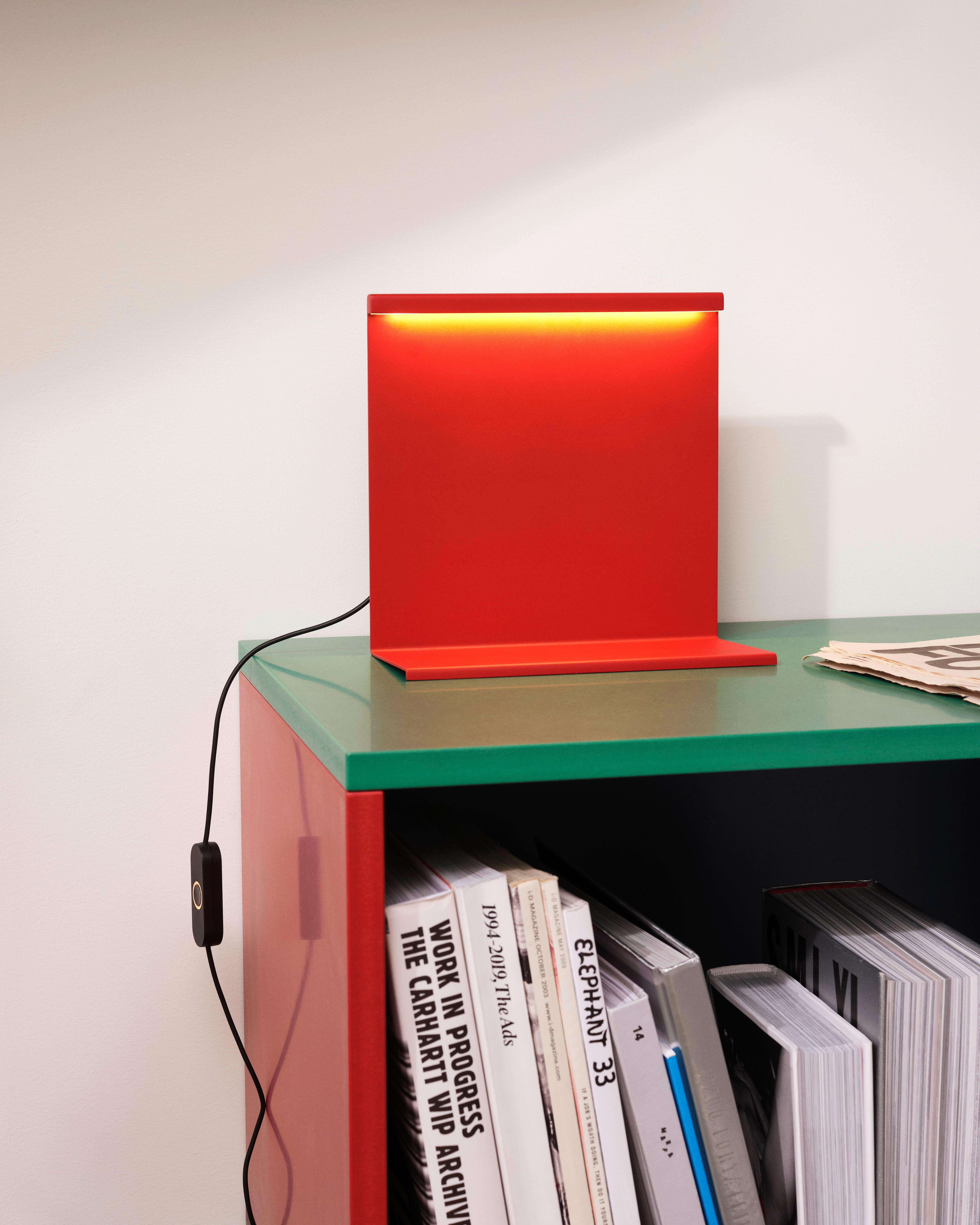 Inspired by the innovative architecture of fellow Mexican Luis Barragan, Moisés Hernández designed the LBM Table Lamp to reflect his fascination with monolithic geometry, color, light and shadows. Constructed from thin planes of vertical sheet