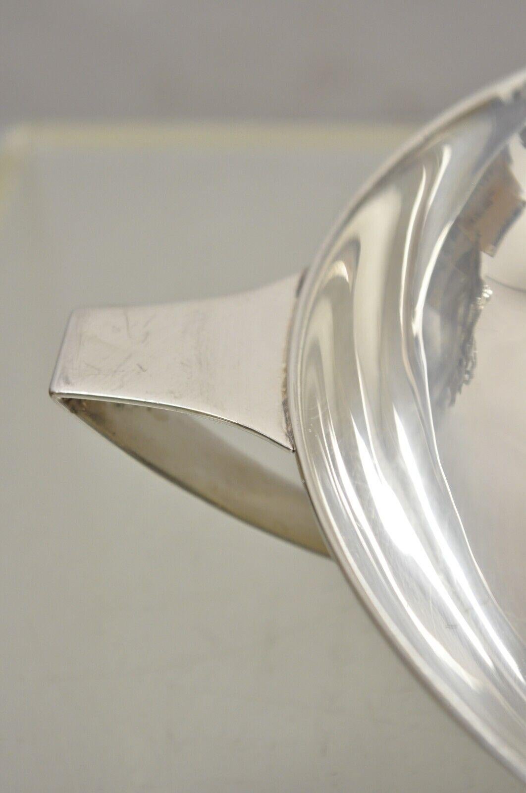 L.B.S. Co. Plato hondo redondo plateado de Sheffield inglés con dos asas Chapado en plata en venta