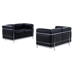 LC 2 - Pair of sofas in black leather by Le Corbusier