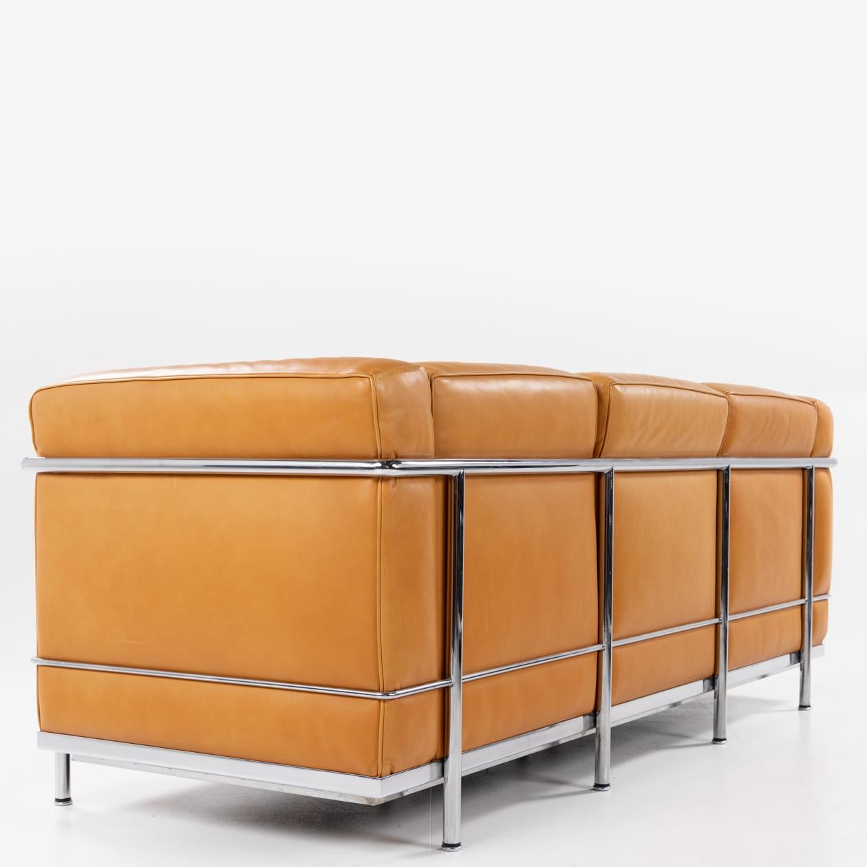 LC 3 three seater sofa in cognac leather. Le Corbusier / Cassina