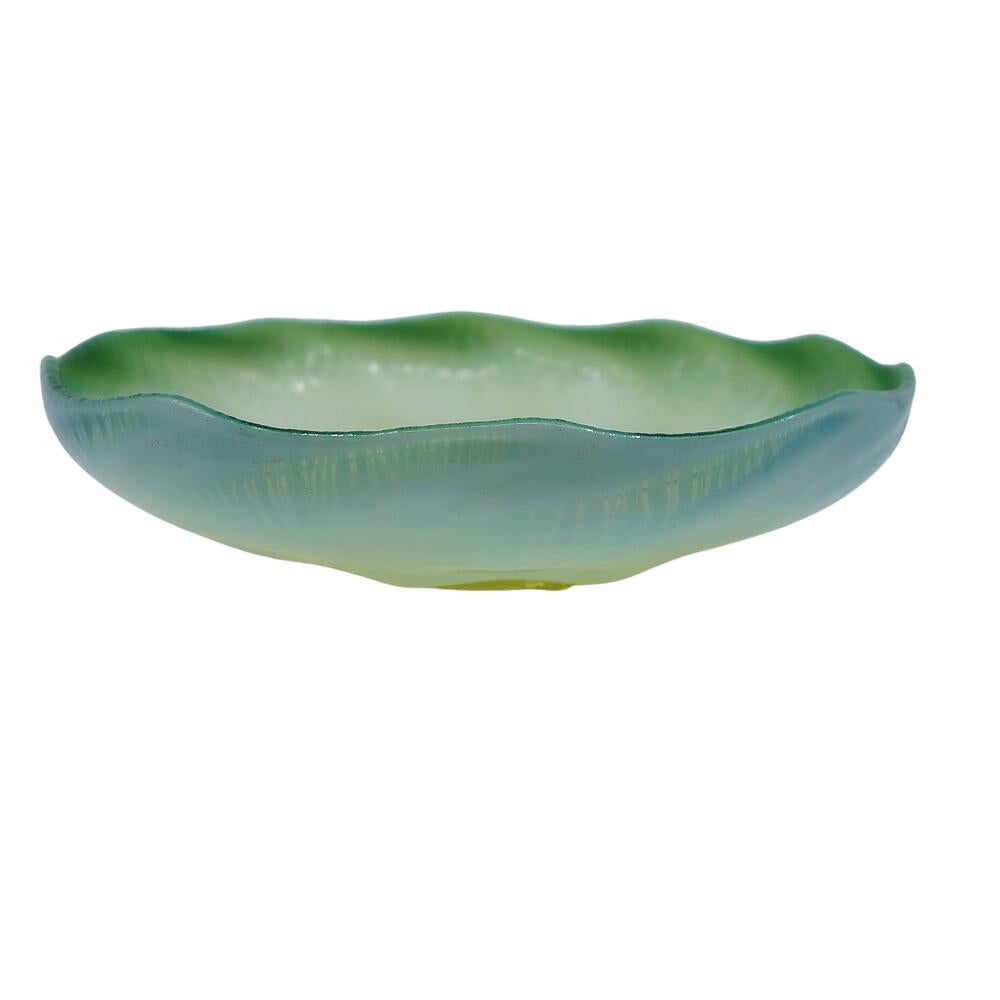 Offering this outstanding Louis Comfort Tiffany Favrile pastel green and opalescent decorated iridescent clear art glass footed 