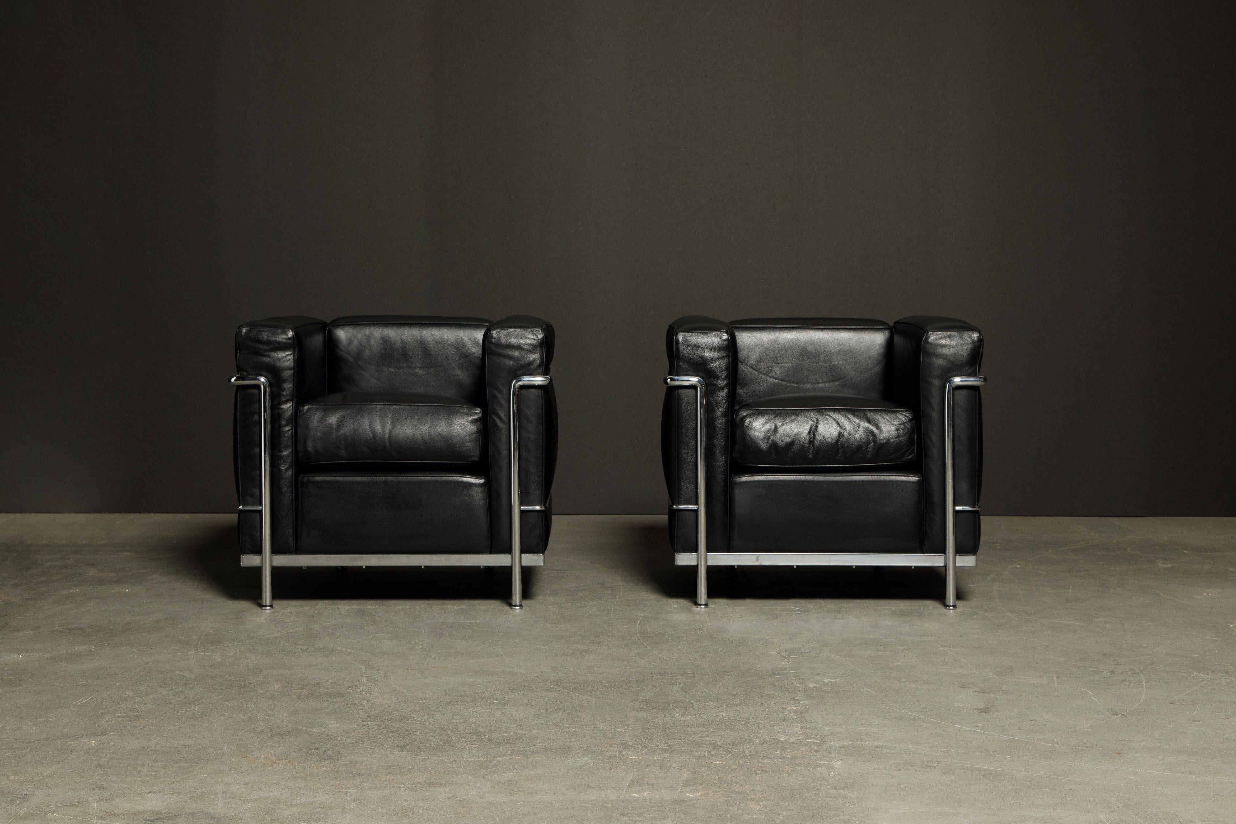 This incredibly comfortable pair of Le Corbusier for Cassina (authentic signed) LC2 Club Chairs in gorgeous thick Italian black leather, priced in this listing individually.

The LC2 was designed in 1928 by Le Corbusier; his cousin and colleague