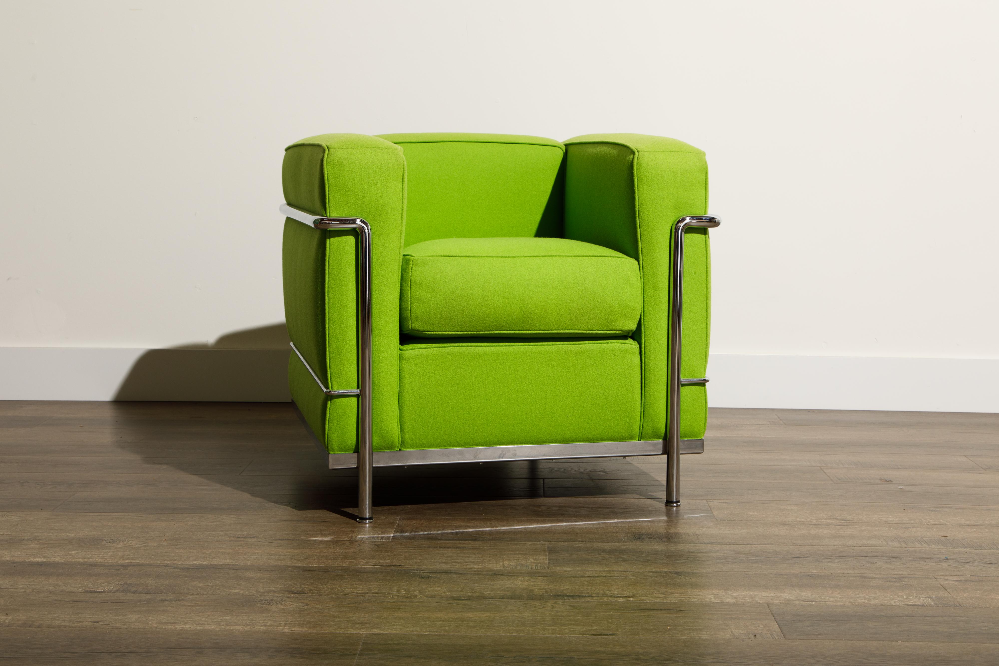 An incredibly comfortable and signed (authentic) 'LC2' Club Chair designed in 1928 by Le Corbusier, Pierre Jeanneret and Charlotte Perriand for Cassina in an interesting day-glo green color fabric. Produced by Cassina from 1965 to today, this