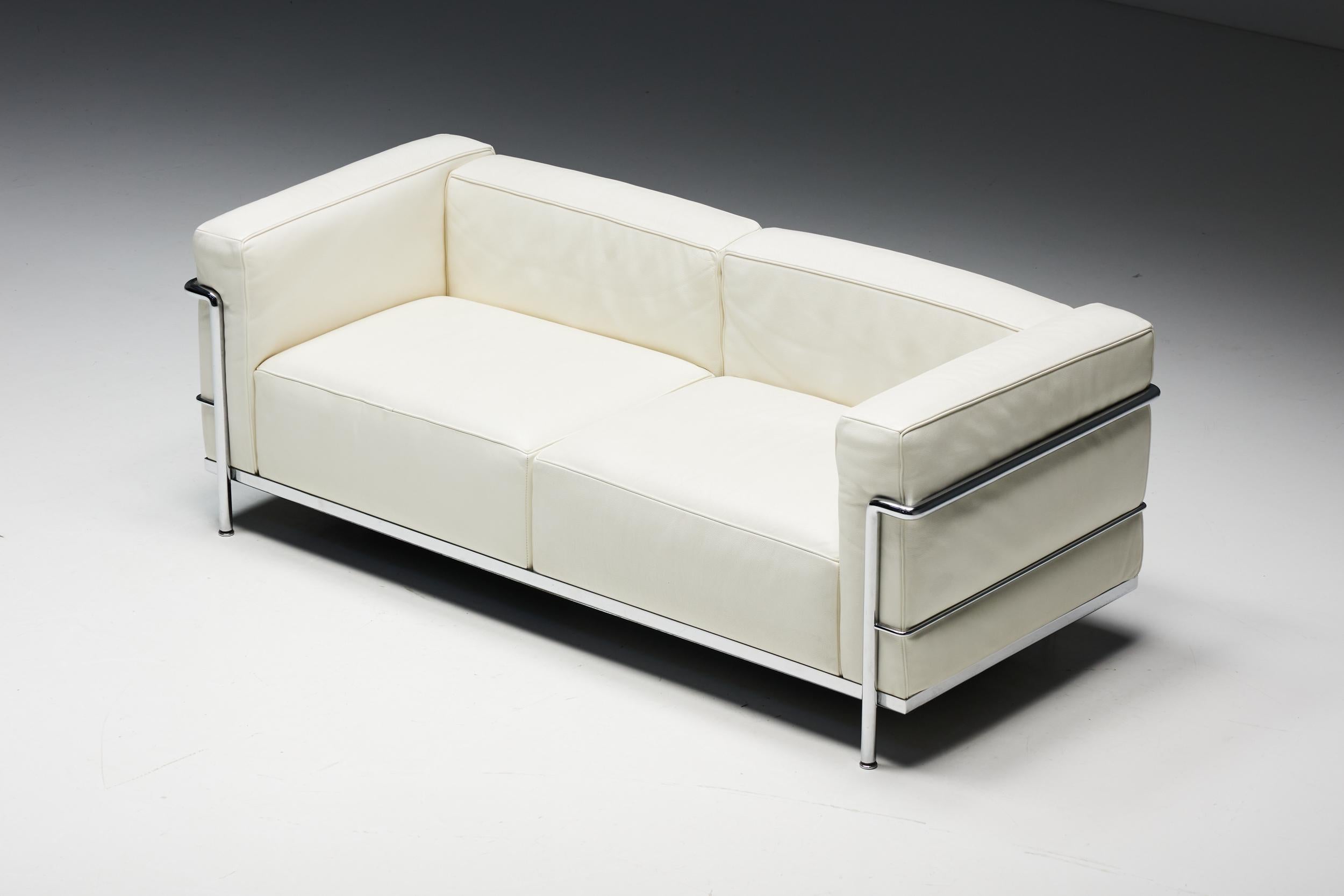 LC3 two-seat sofa for Cassina. An iconic piece of modernist design, designed in 1928 by Le Corbusier, his cousin and colleague Pierre Jeanneret, and Charlotte Perriand. The sofa is a symbol of timeless elegance and exceptional comfort, with a unique