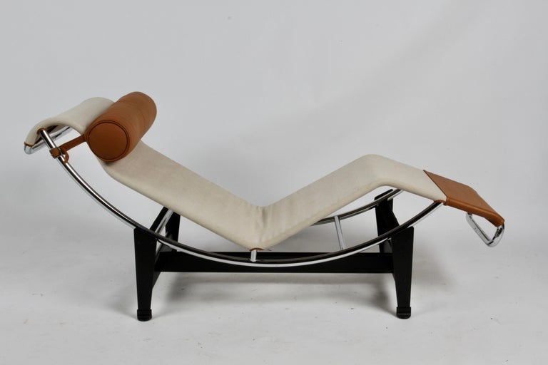 Designed by Le Corbusier, Pierre Jeanneret and Charlotte Perriand for Cassina. This LC4 has a rich uncommon color combination in tear-resistant Ecru Canvas and Tobacco leather, this model isn't sold or offered in the U.S. Therefore making it a