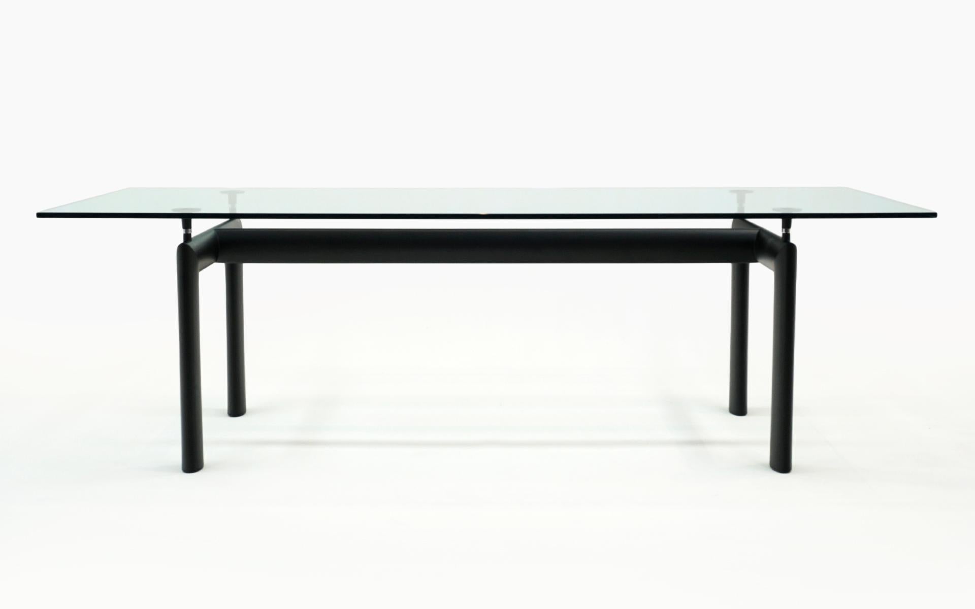 Completely original glass and black lacquered steel frame dining / conference table model LC 6 by Le Corbusier for Cassina. The LC6 Table, designed in 1928, has become one of the most important International Style / Bauhaus tables of the 20th