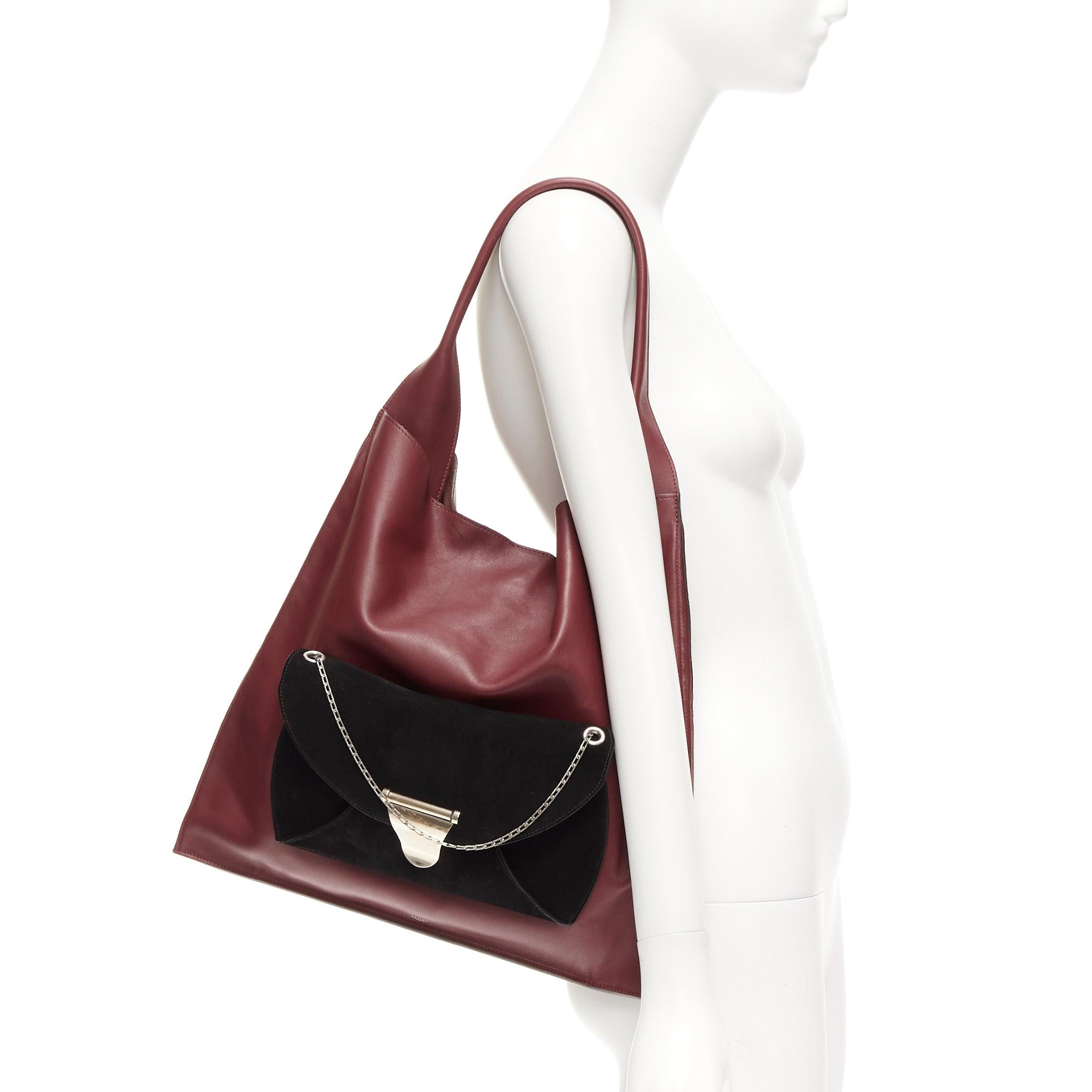 LD COELINE Phoebe Philo 2016 Medium Shopper burgundy black suede envelop pocket tote bag
Reference: NKLL/A00247
Brand: Celine
Designer: Phoebe Philo
Model: Dual
Material: Leather, Suede
Color: Burgundy, Black
Pattern: Solid
Closure: Snap