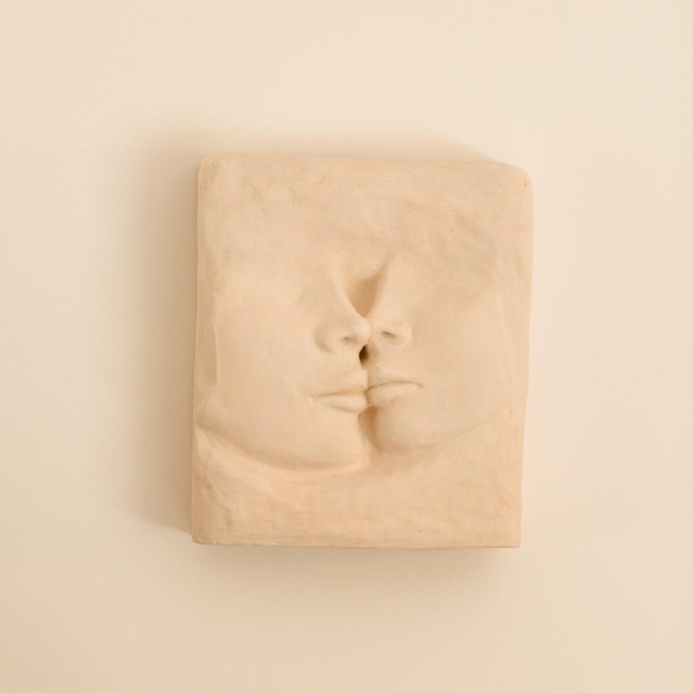 Le Baiser Sconce by Di Fretto
Dimensions: W 23 x D 9 x H 28 cm
Materials: White Faience (not glazed)

The Le Baiser wall light is an Italian-inspired bas relief fitting into a contemporary universe: the bas relief becomes a wall light.

It is a