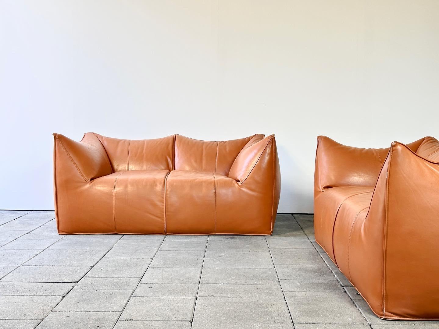 cognac leather Le Bambole-seater Sofa designed by Mario Bellini for B&B Italia in 1978. 

Price per sofa, second matching sofa available.

The Bambole series today is a true icon amongst the 1970s design furnitures and did win Mario Bellini the