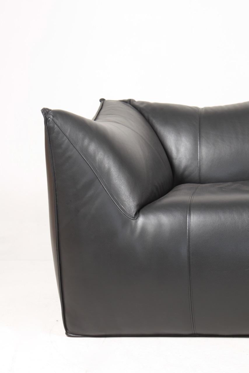 Great looking sofa in black leather. Designed Mario Bellini and made by B&B Italia. The sofa been cleaned, waxed and is from a non-smoker home. Great original condition.