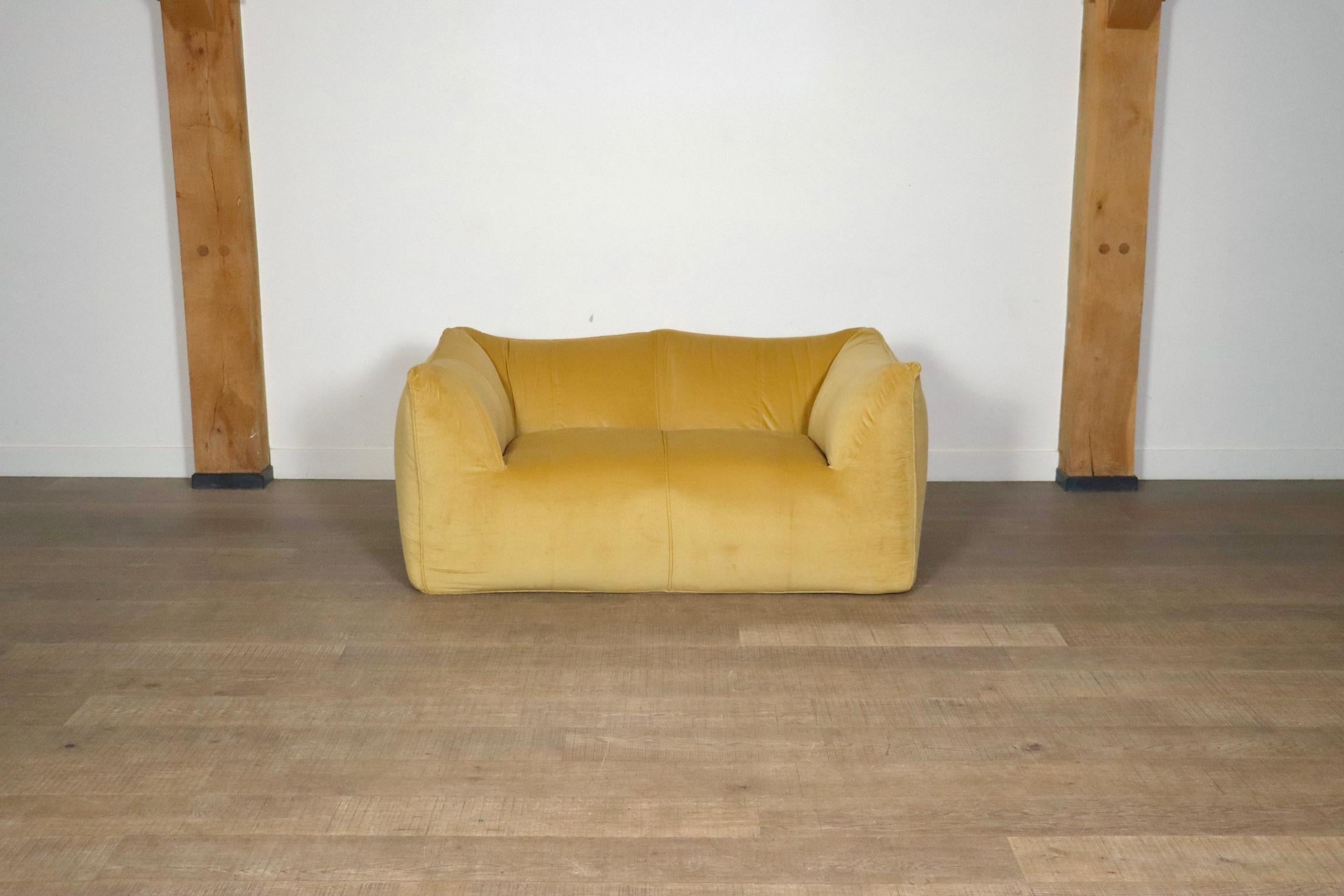 
Stunning “Le Bambole” two seater sofa designed by Mario Bellini for B & B Italia in the 1970s. A beautiful edition in high quality Mustard cotton velvet with a nice soft touch adding to this comfortable and “chunky” design. Besides the outstanding