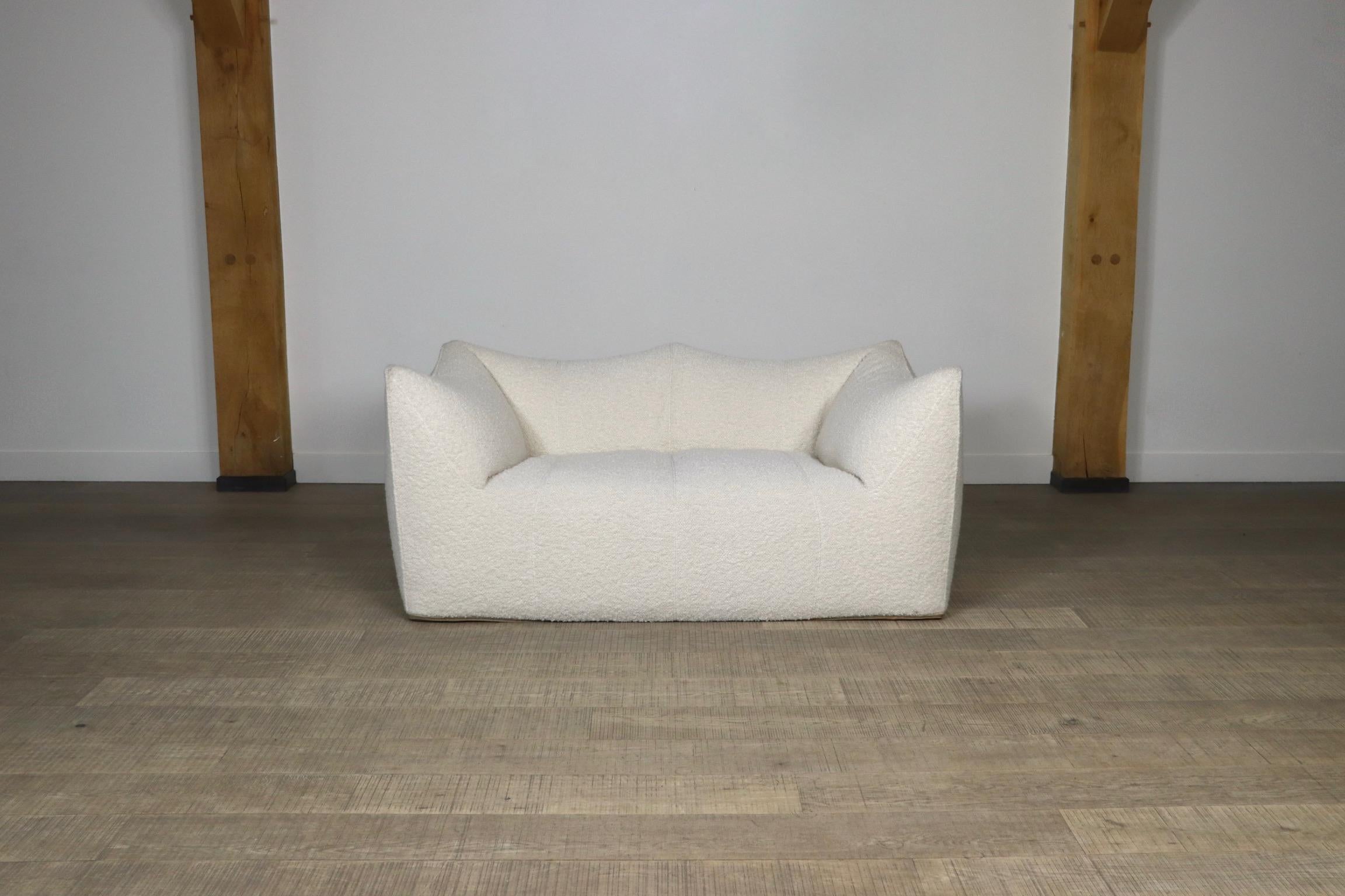 Stunning “Le Bambole” two seater sofa in high quality cream bouclé designed by Mario Bellini for B & B Italia in the 1970s. Besides the outstanding comfort this iconic sofa is famous for its timeless looks. The design was awarded the 1979 'Compasso