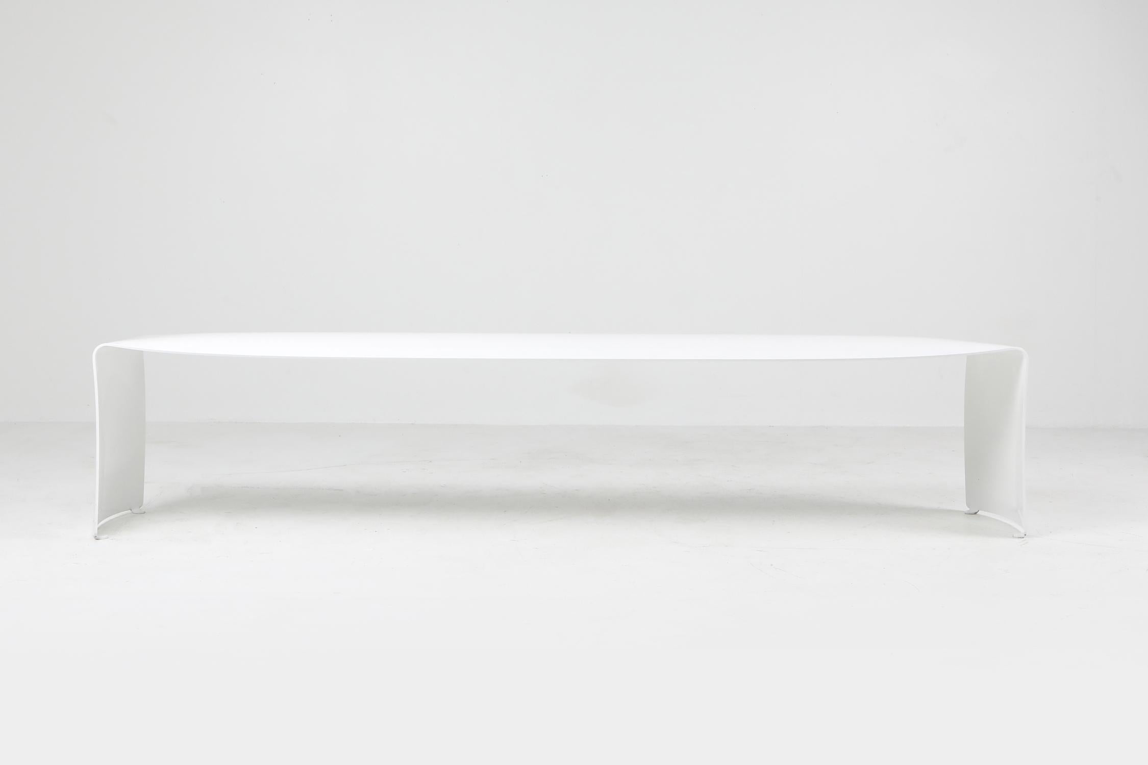 White lacquered bench, Xavier Lust, MDF Italia, 2002

A bench made out of a curved aluminium sheet. Finish gloss white lacquered. Suitable for outdoor.
The matching table and the verner panton chairs are available in another listing.
Born on