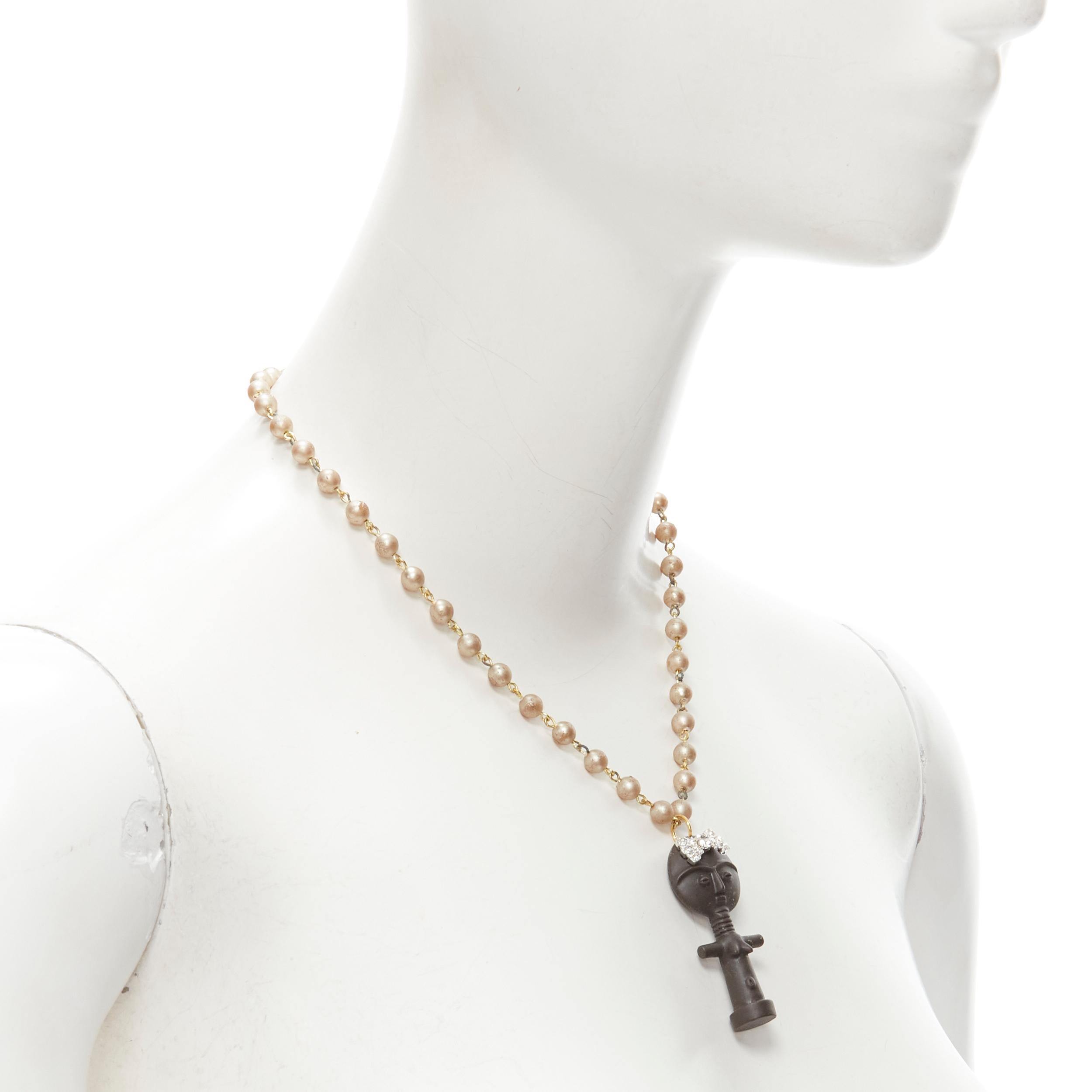 LE BIJOUX DE SOPHIE black crystal aboriginal statue pearl chain necklace
Reference: ANWU/A00319
Brand: Le Bijoux De Sophie
Material: Faux Pearl, Plastic
Color: Pearl, Black
Closure: Lobster Clasp
Extra Details: Brand logo metal