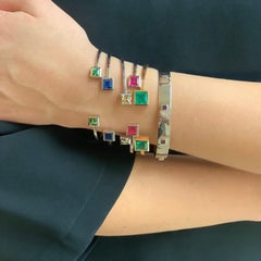 Le Carré Bangle in 18 Carat White Gold Set with 2 Rubellites of 1.78 Carat