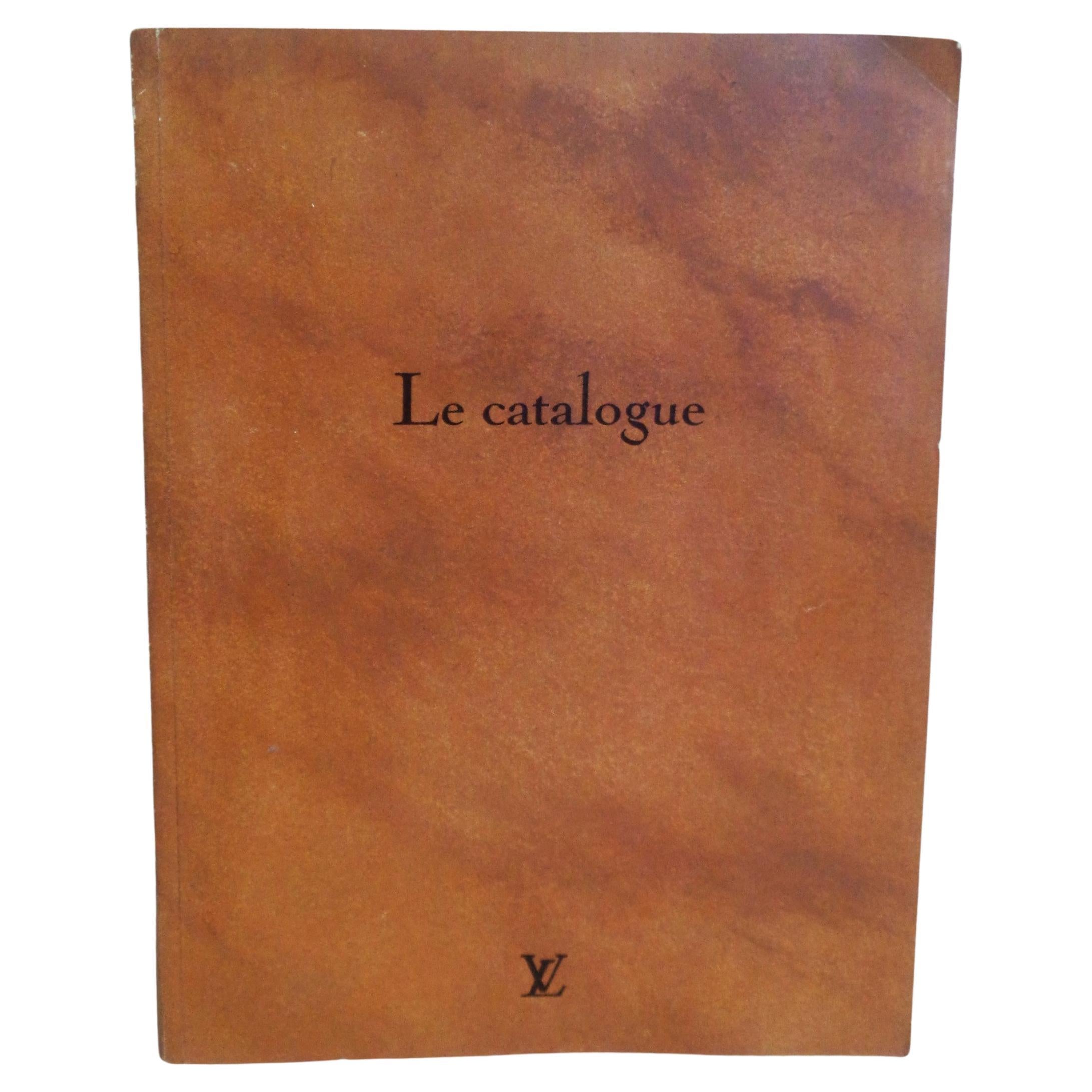 Le catalogue - Louis Vuitton - 1993 number 1 - printed in France. Black white and color illustrations. Text in French and English. Product Index and comprehensive list of stores worldwide. Louis Vuitton North America Price List USD - effective