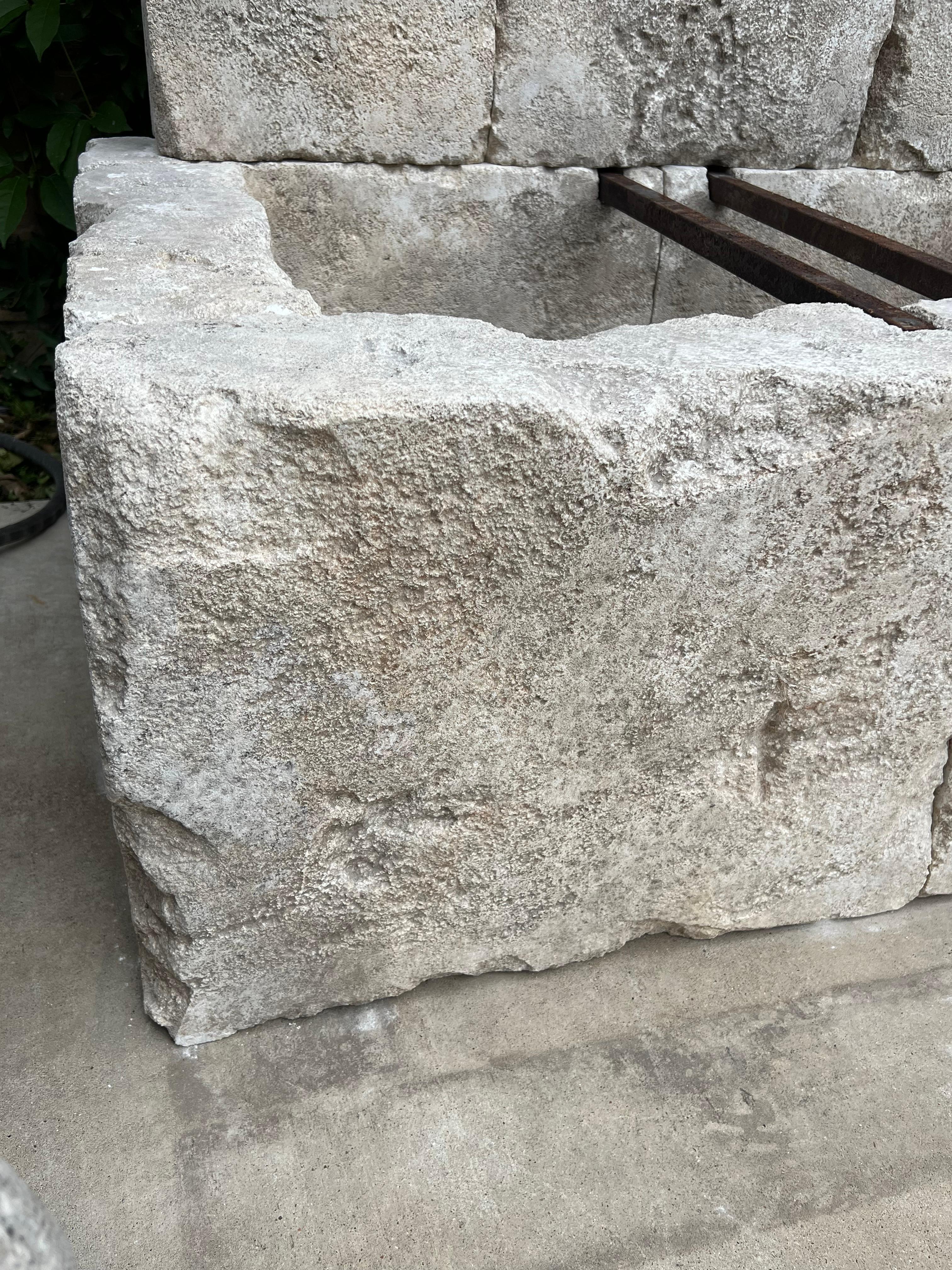 Le Chaux Hand Carved and Distressed Limestone Block Fountain, South of France For Sale 3