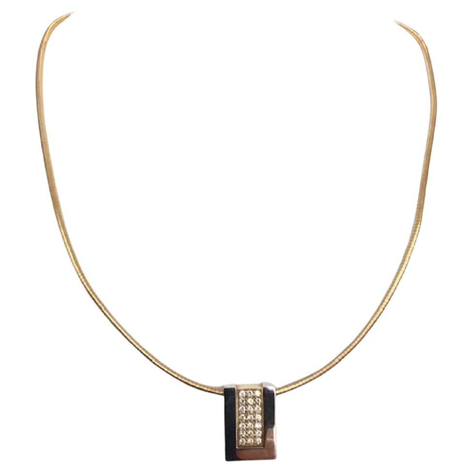 Le Chic 18 carat gold  diamond pendant with omega  gold necklace For Sale