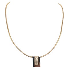 Le Chic 18 carat gold  diamond pendant with omega  gold necklace