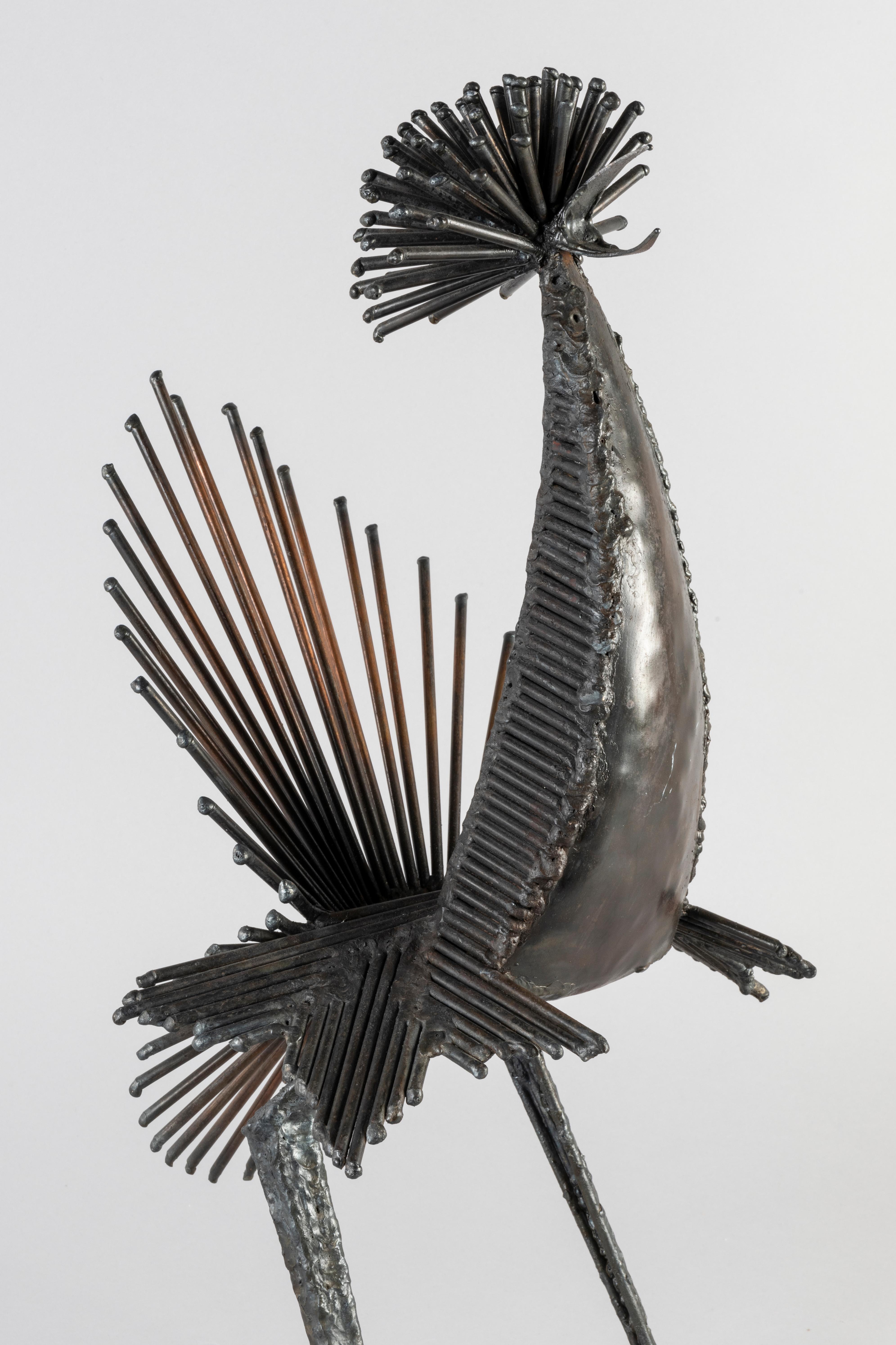 Humour, fantasy in Michel Anasse sculptures. His animal masterpieces are well-known all-over the world. This object represents a coq in soldering iron, circa 1965. He's French artist born in 1935.