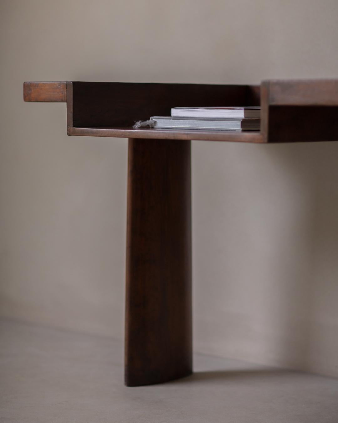 It’s not just a desk. It’s the LC/BD-01-A.

Aren’t you impressed with the elegant legs underneath the top? Looking at them, there must be a reference to the wings of an airplane. Just like the ventilator shutters Le Corbusier designed for buildings
