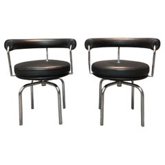 Le Corbusier & Cahrlotte Perriand for Cassina Signed Pair LC7 Armchairs, 2000s