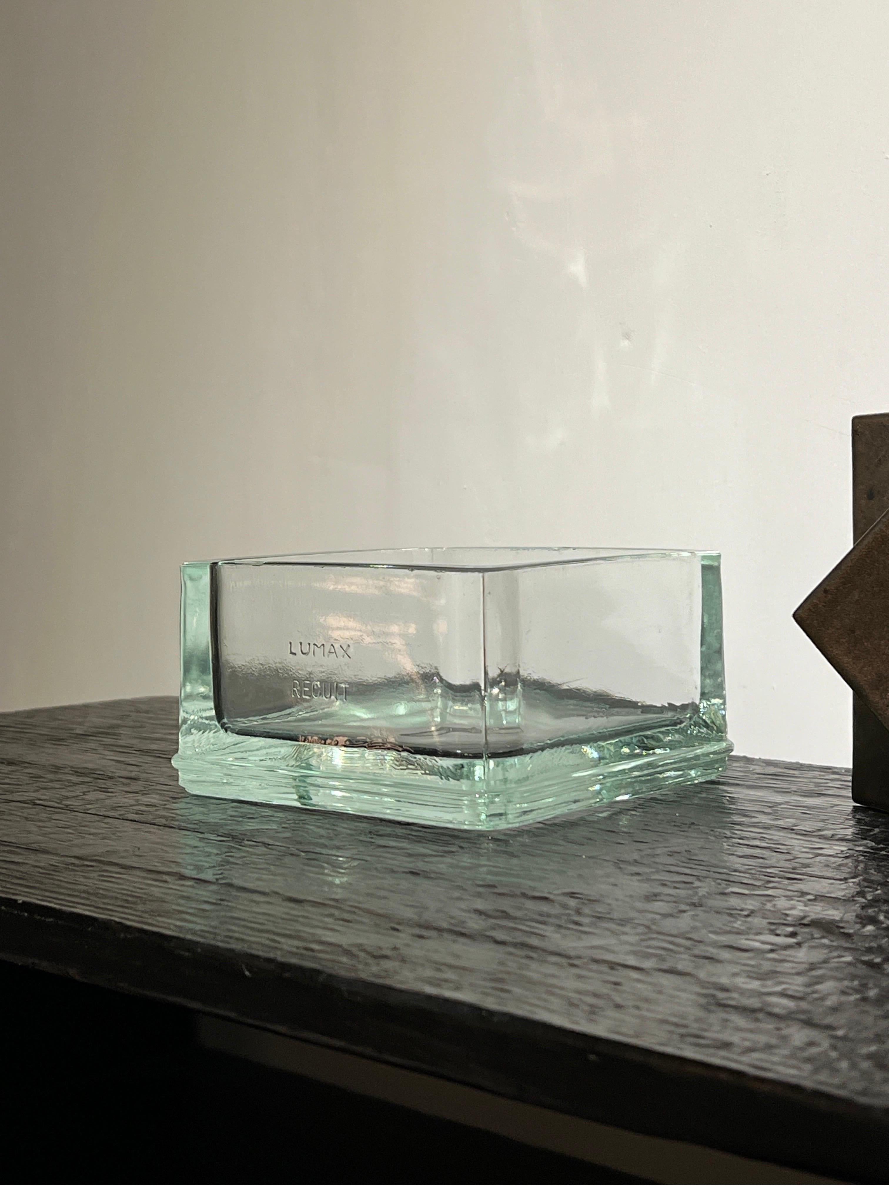 Rare authentic and iconic modern glass storage compartment or ashtray designed by the famous French architects of the 20th century Le Corbusier and Charlotte Perriand for Lumax. 

Le Corbusier and Charlotte Perriand, pioneering figures in modern and