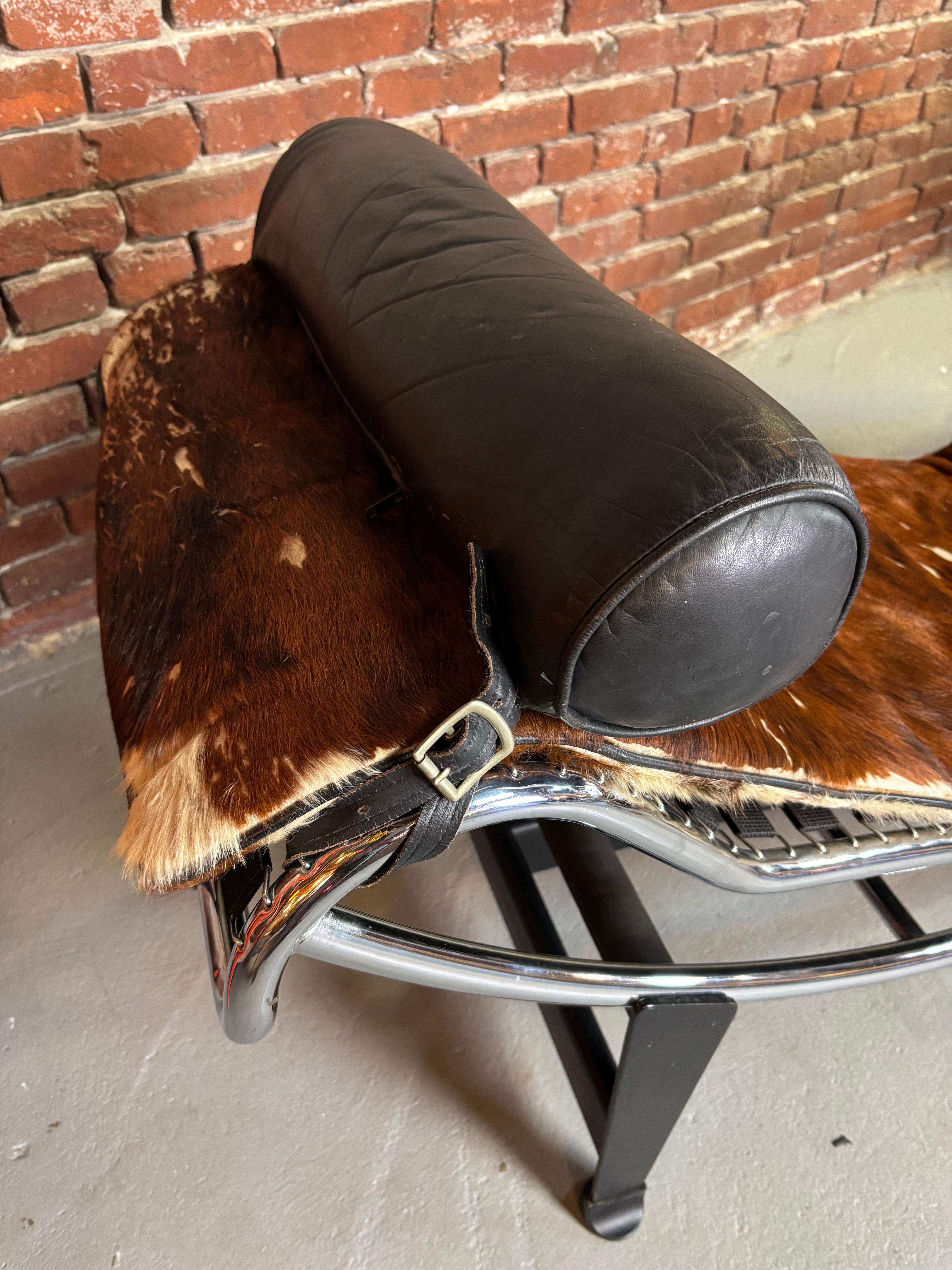 Le Corbusier, Pierre Jeanneret and Charlotte Perriand Iconic Chaise Lounge first designed in the late 1920's.  This model dates to the late 1970's.  Overall in great shape with Replacement Straps from Cassina and new foam put into the pad.  This
